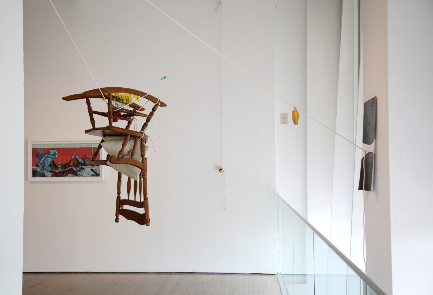  Ayesha Kamal Khan,&nbsp; This May Fall (chairlift) &nbsp;(2015)&nbsp;and Chitra Ganesh,&nbsp; Her Nuclear Waters  (2013), exhibition view, photograph by Sadia Shirazi. 
