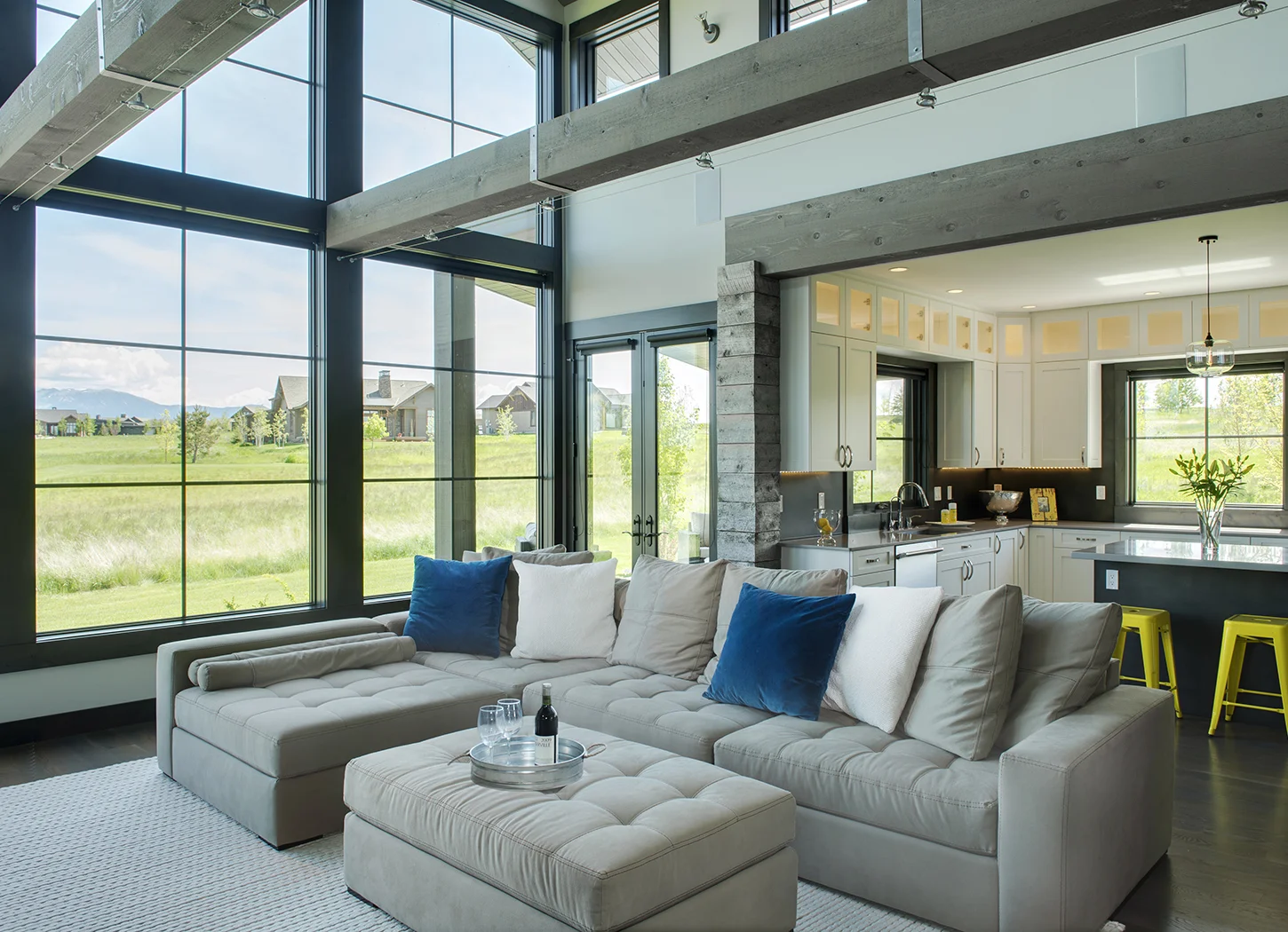 I love the large beams and the barnwood accents in this home. The open floorplan creates the perfect entertaining environment. The french doors go right out to the spacious patio overlooking the Black Bull golf course.