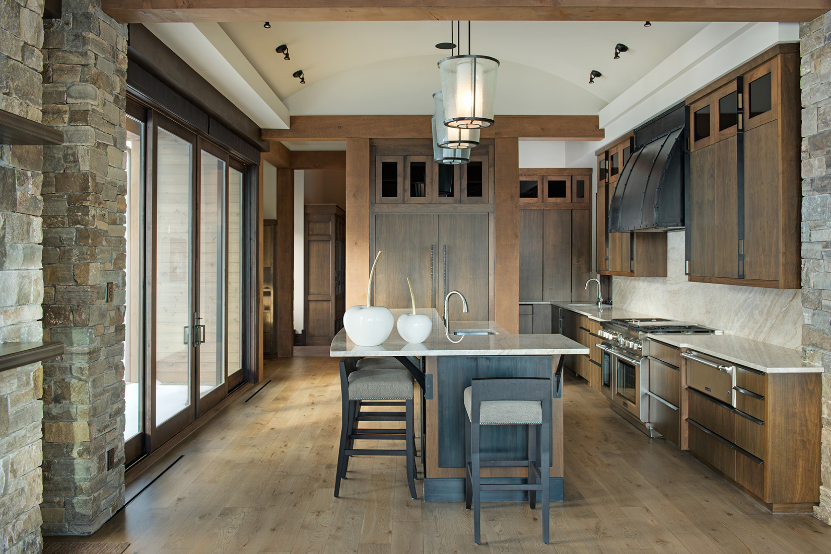 This kitchen is perfect for the entertainer. The windows looking out over the ski hill open the space up nicely!