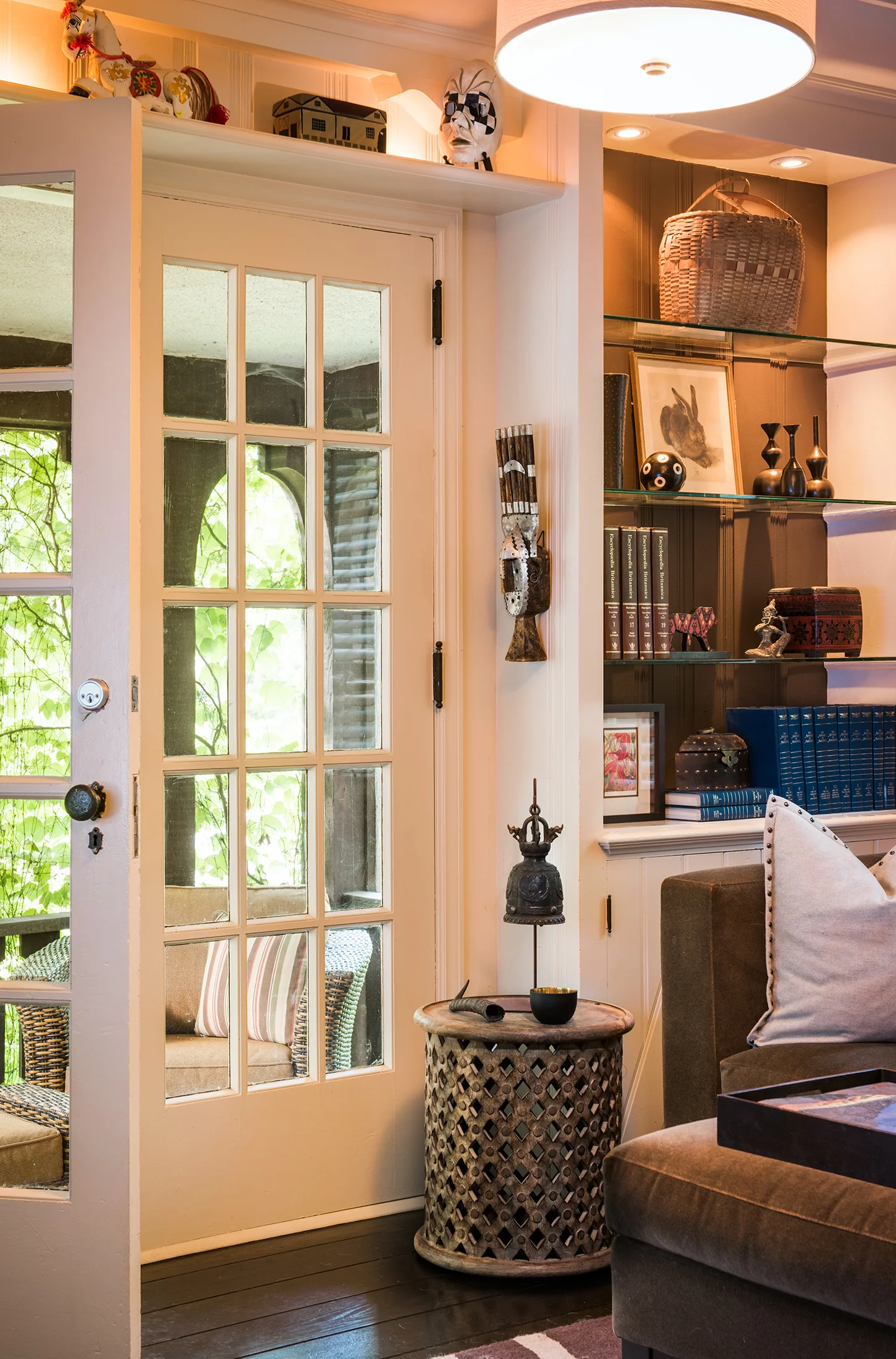 This family room in Edina, Minnesota is so cozy especially with the screen in porch attached. Interior Design - Ilten Design