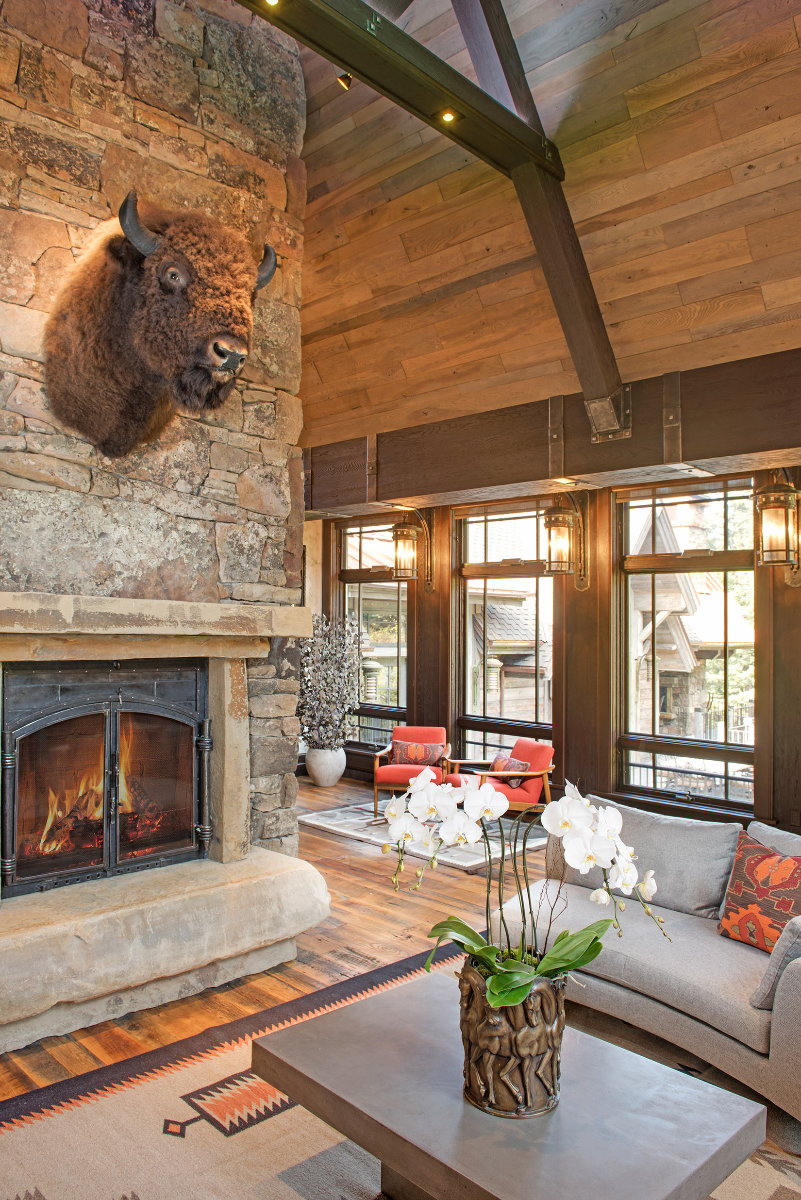 What is a Montana home without a large stone fireplace? The architecture is amazing! I love how you can sit by the fire while looking out the windows and enjoying the outdoors.