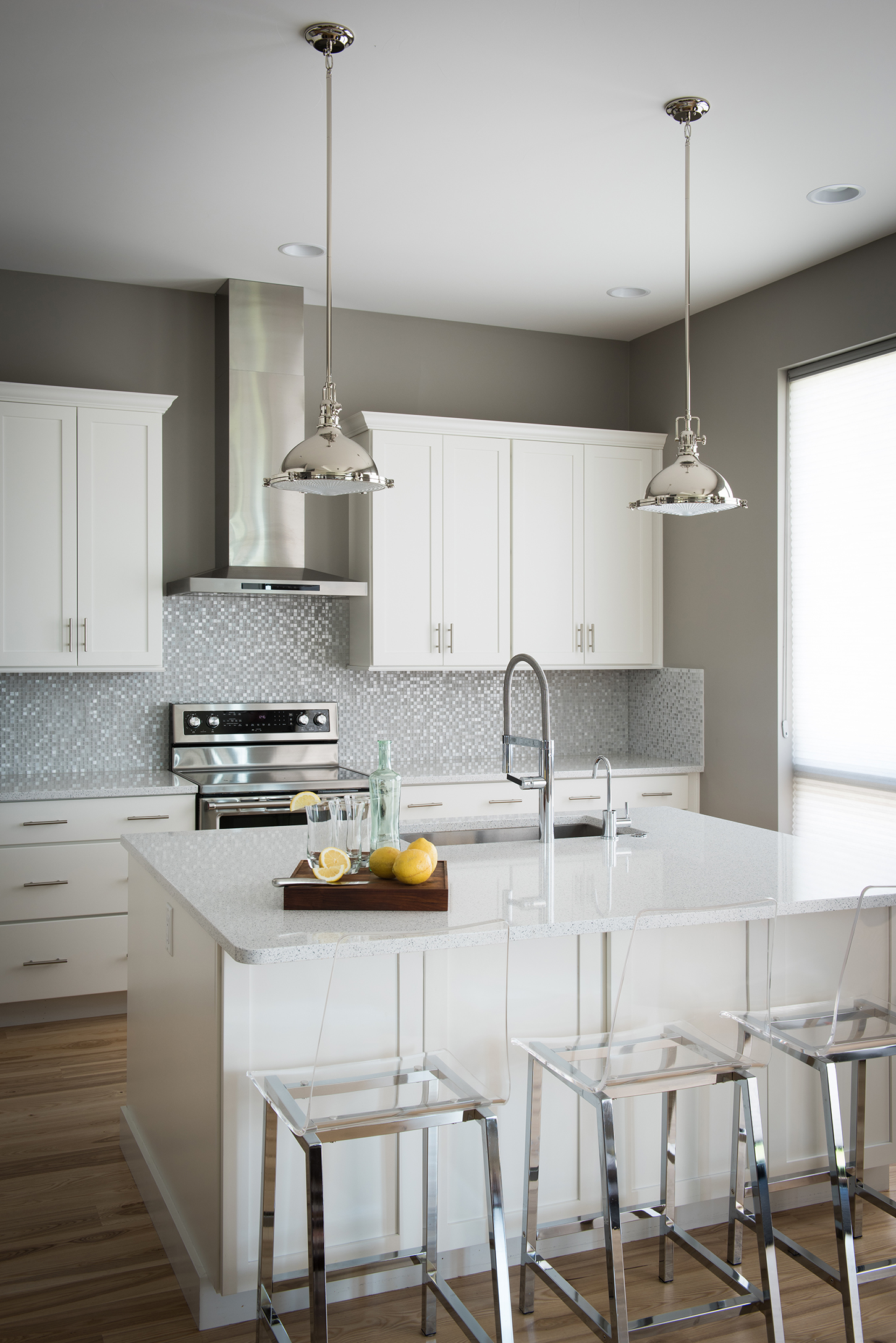 The bright & airy feel is what draws me to this stylish kitchen. General Contractor - Trademark Construction