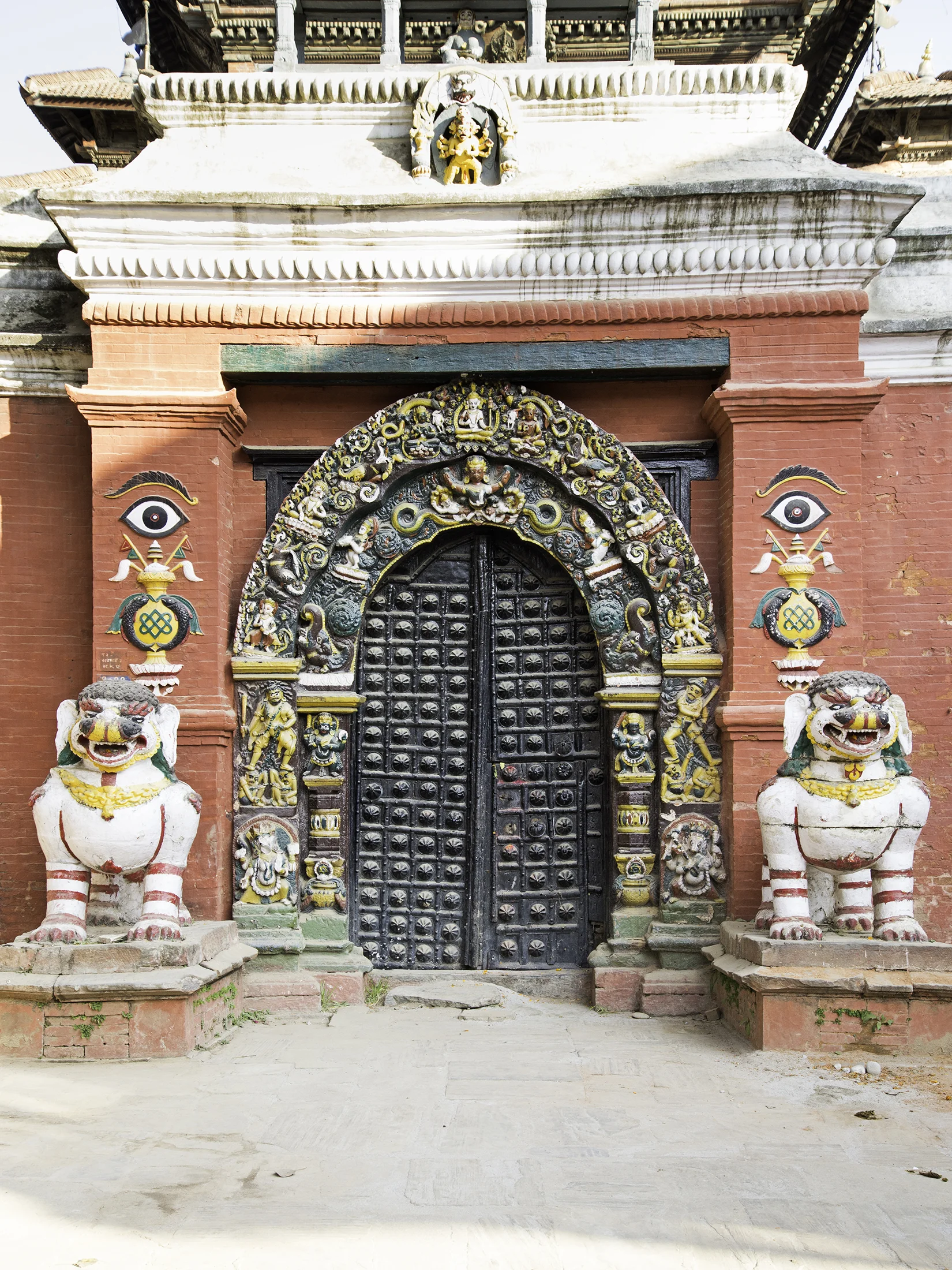 This door stands proudly in Durbar Square. The colorful statues, colorful frame, and texture on the door really drew me to it. 