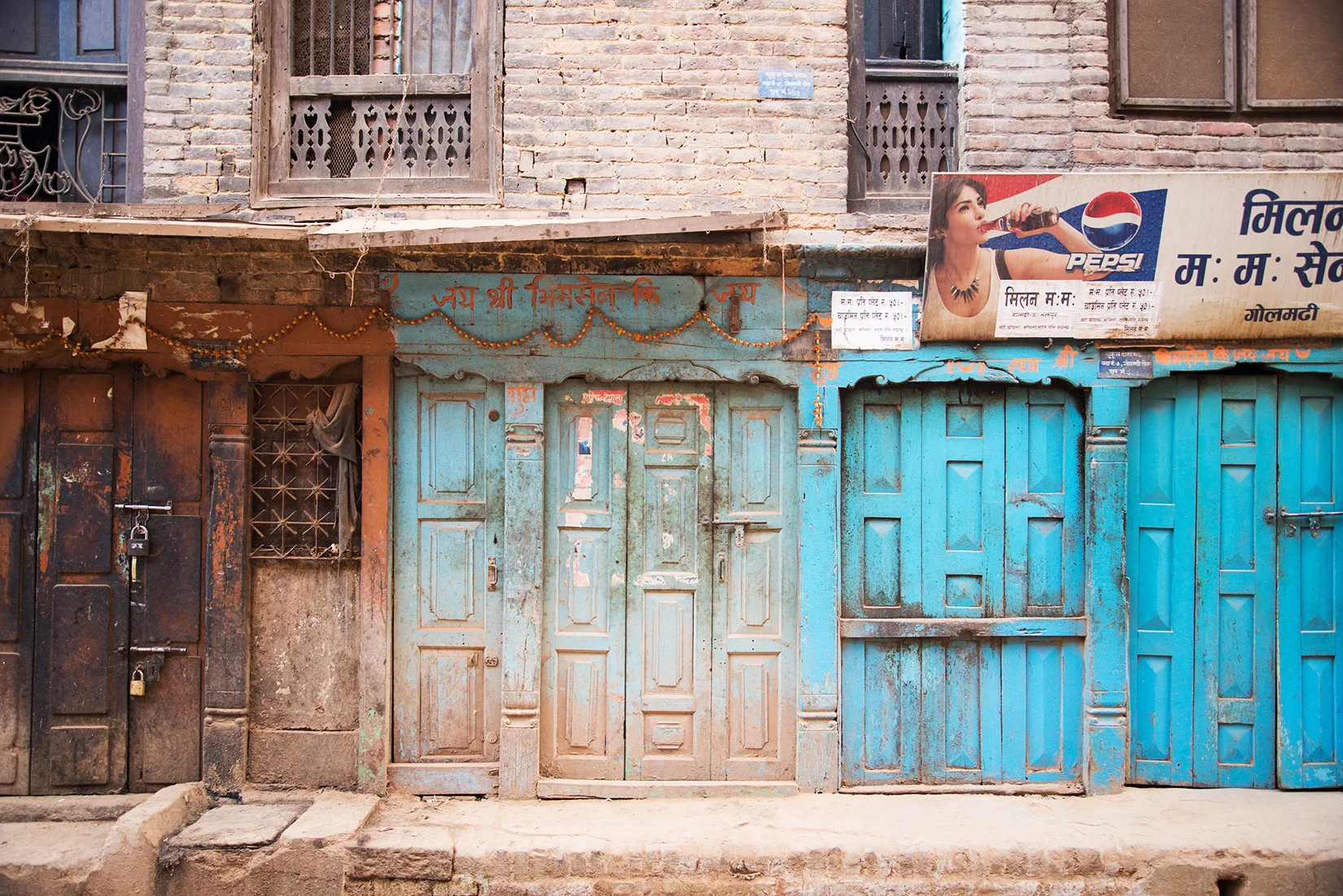 These doors line the busy streets of Kathmandu. The colors and textures are so eye catching. 