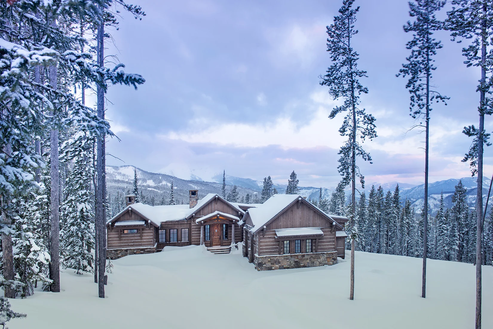 The rustic home is meant to be situated in a rustic setting - here being the woods and mountains... spectacular! Architect - Centre Sky Architecture Builder - Dovetail Construction