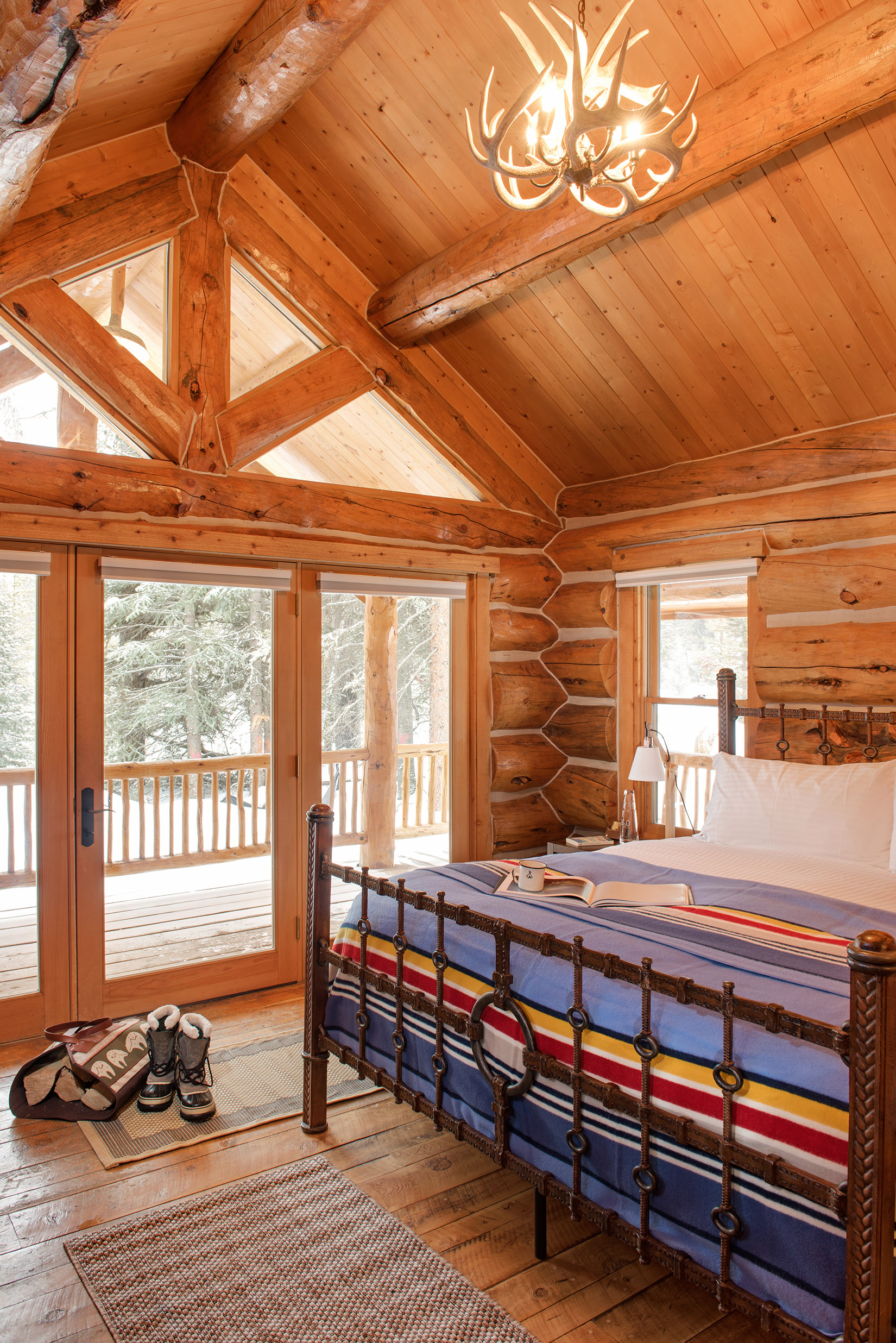 Nothing says rustic like a quaint little cabin on the river. The custom woodwork and setting really create that cozy, rustic feel. Located at Yellowstone Club .