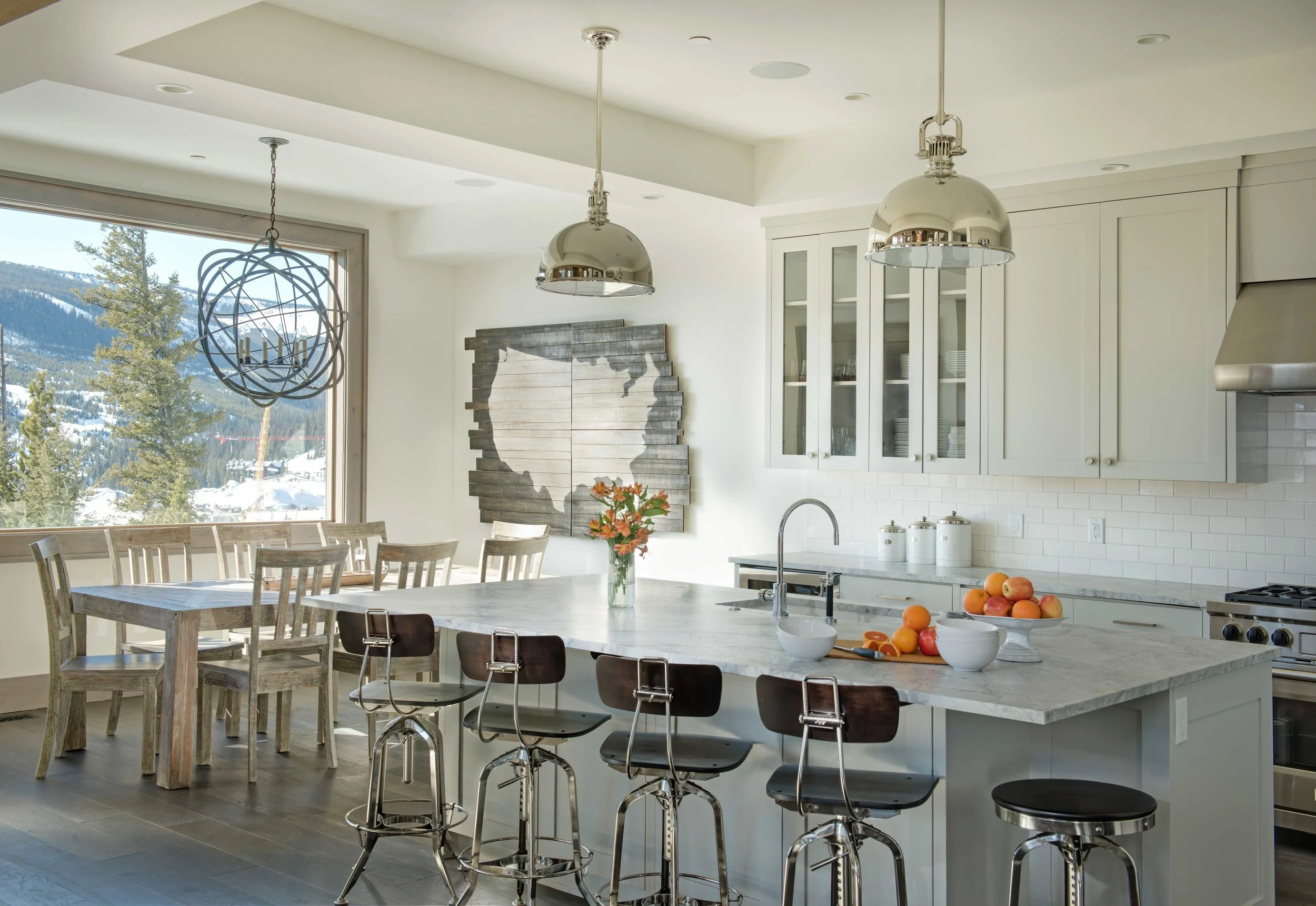 I know this has a lot of kitchen in it, but I love it for that reason - the kitchen and the dining room flow together so well. I also love how bright and airy it feels! Yellowstone Club