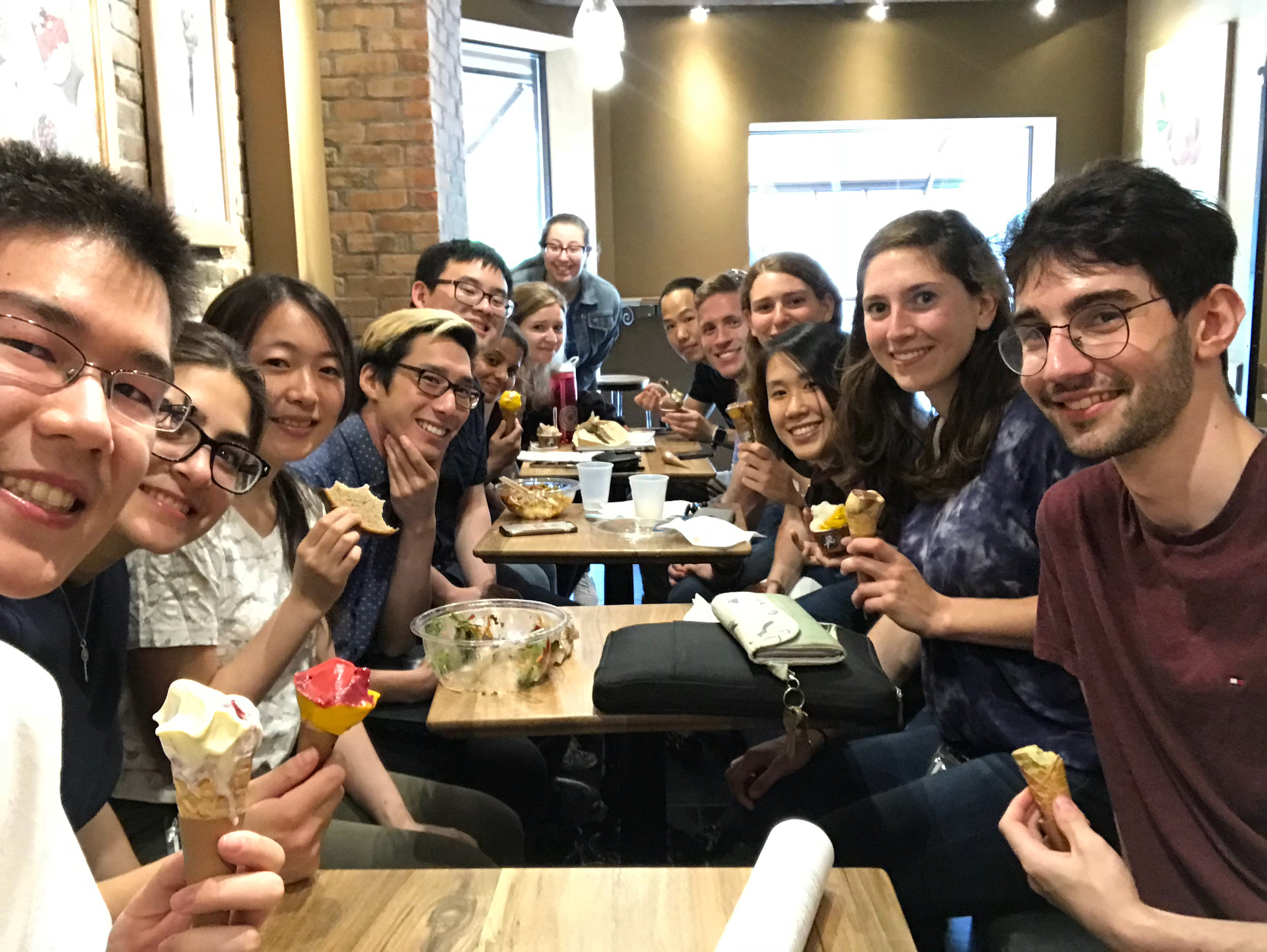 The group enjoys some refreshing gelato to cool off from the hot day.