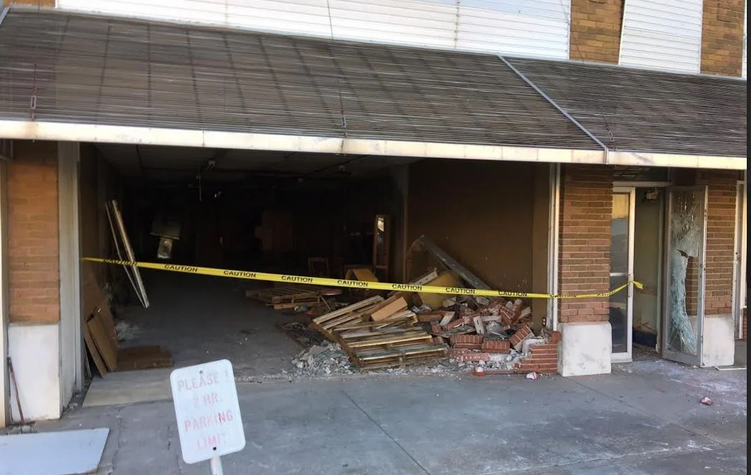 Demolition got a quick start with the store front. - Photo by RDMGtv