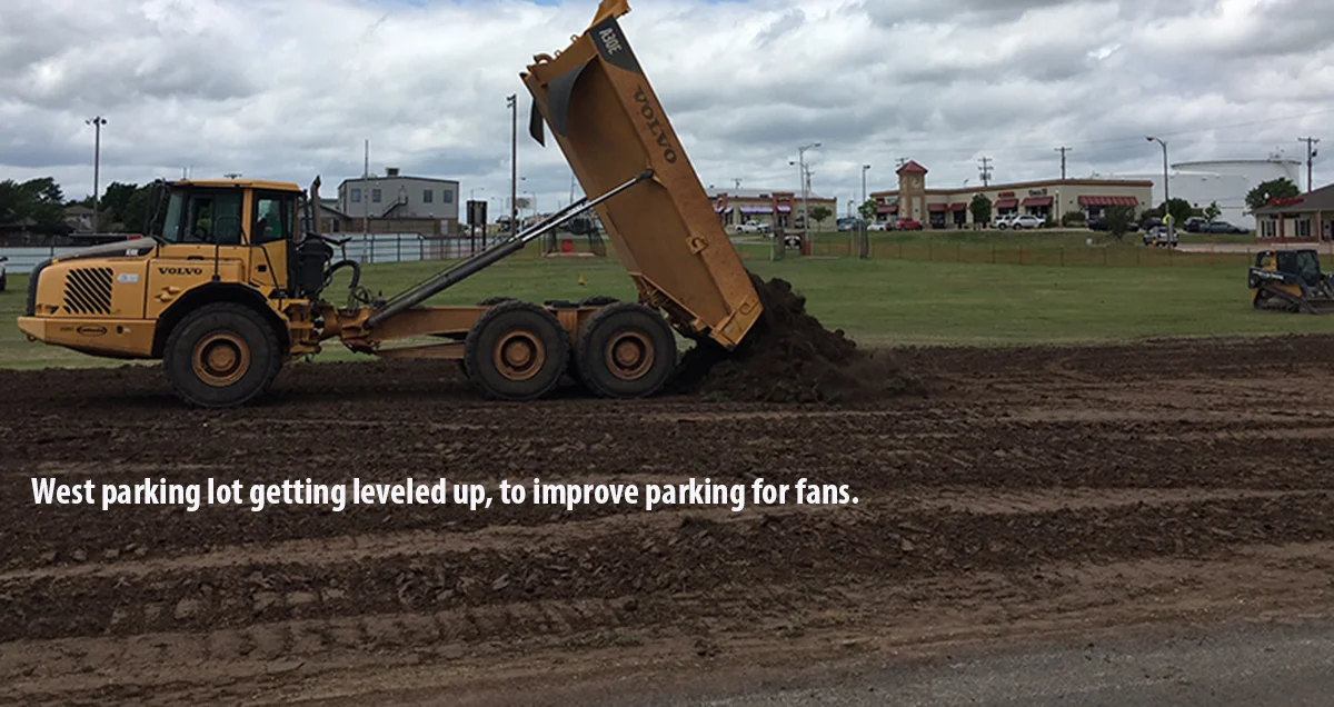 West parking lot gets the top soil for much needed leveling and drainage. Photo by RDMGtv