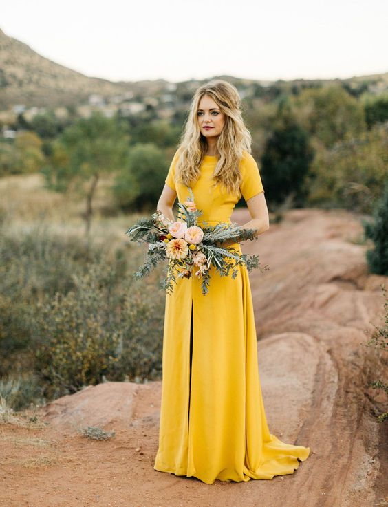 23-a-mustard-short-sleeve-wedding-dress-with-a-front-slit-for-a-non-traditional-boho-bride.jpg