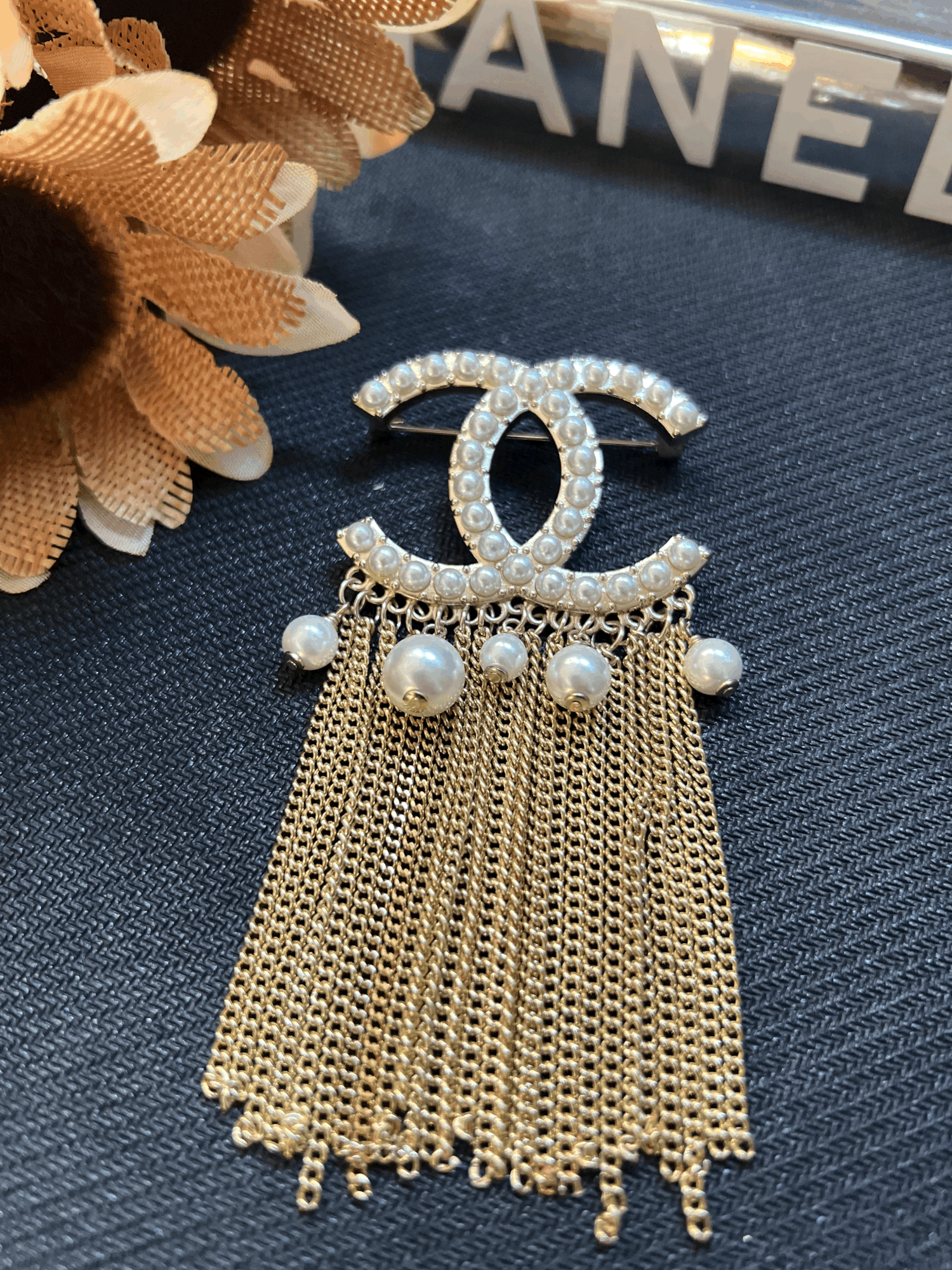 chanel pearl pin brooch