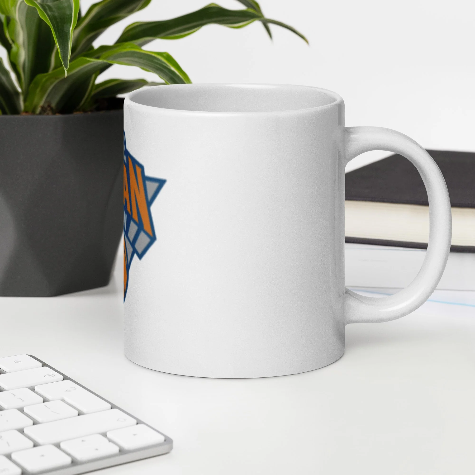 white-glossy-mug-white-20-oz-office-environment-6a1873843eaaf.jpg
