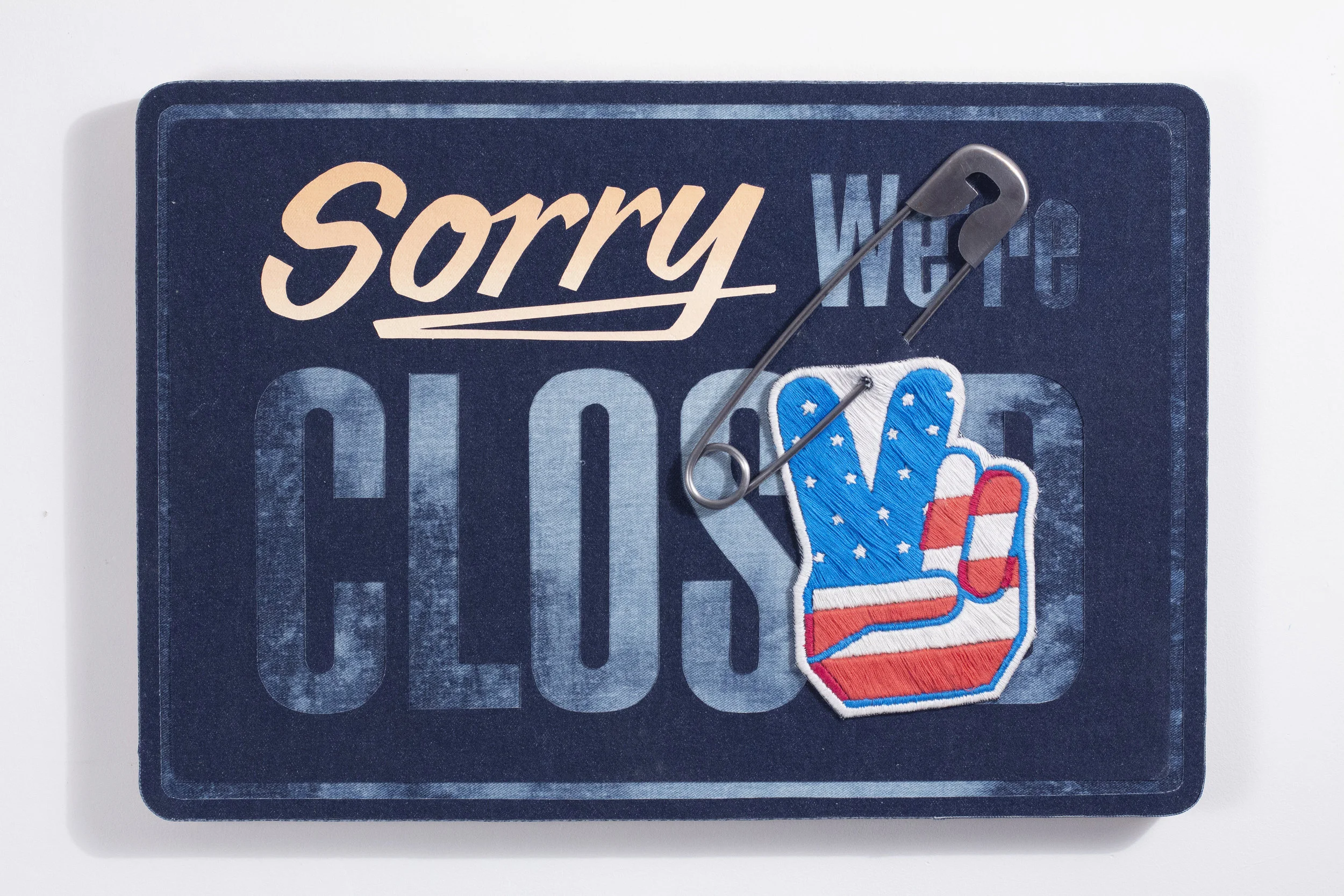“Sorry we’re closed” 16.5x24x2 inches Steel, embroidery, flashe and denim on plywood 2019