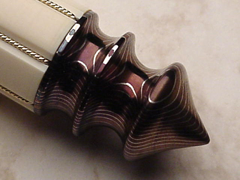 Quillon Dagger with buttcap closeup
