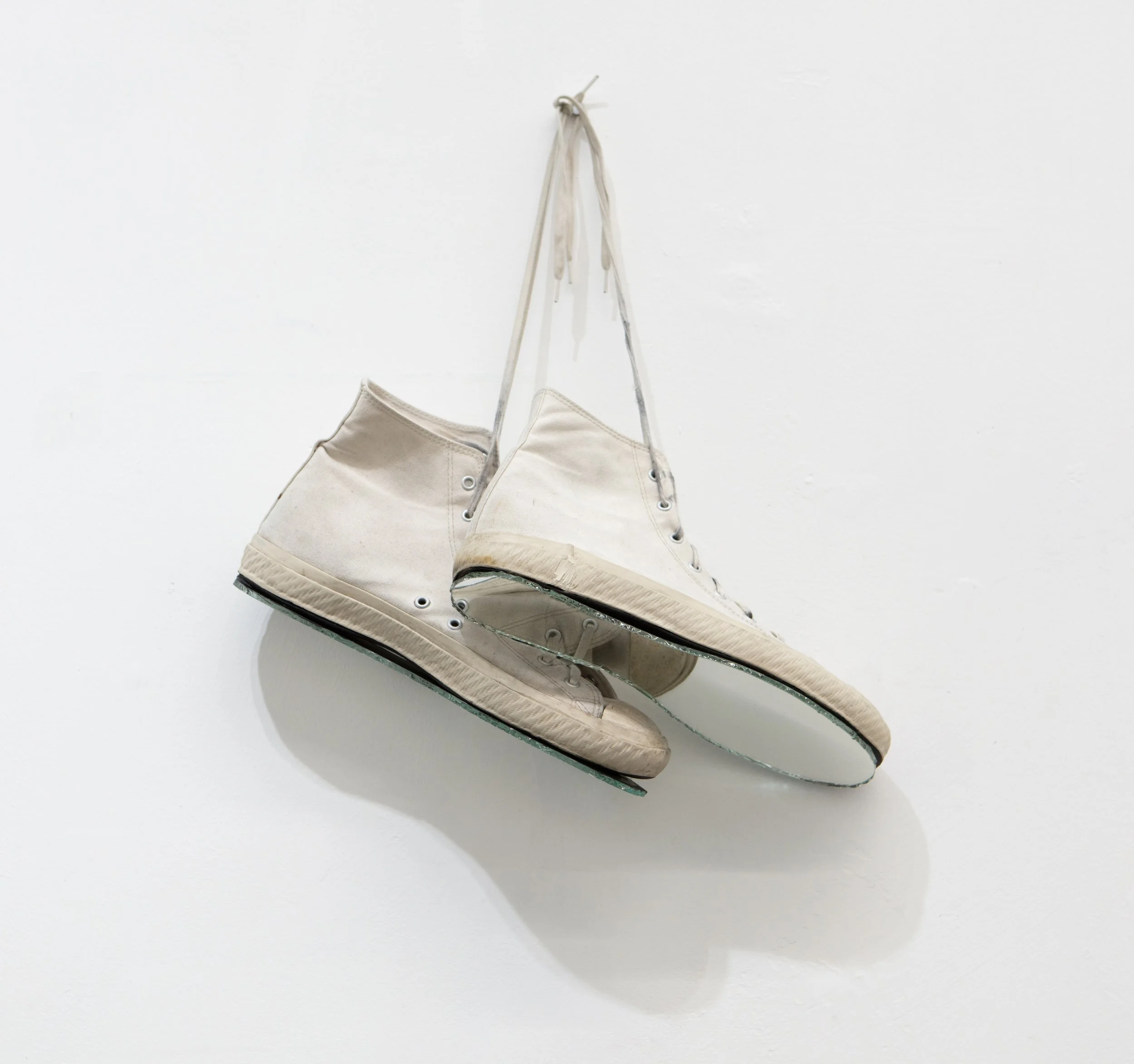  artist’s shoes with mirror soles  mirror on artist-worn shoes  20” × 12” × 8” 