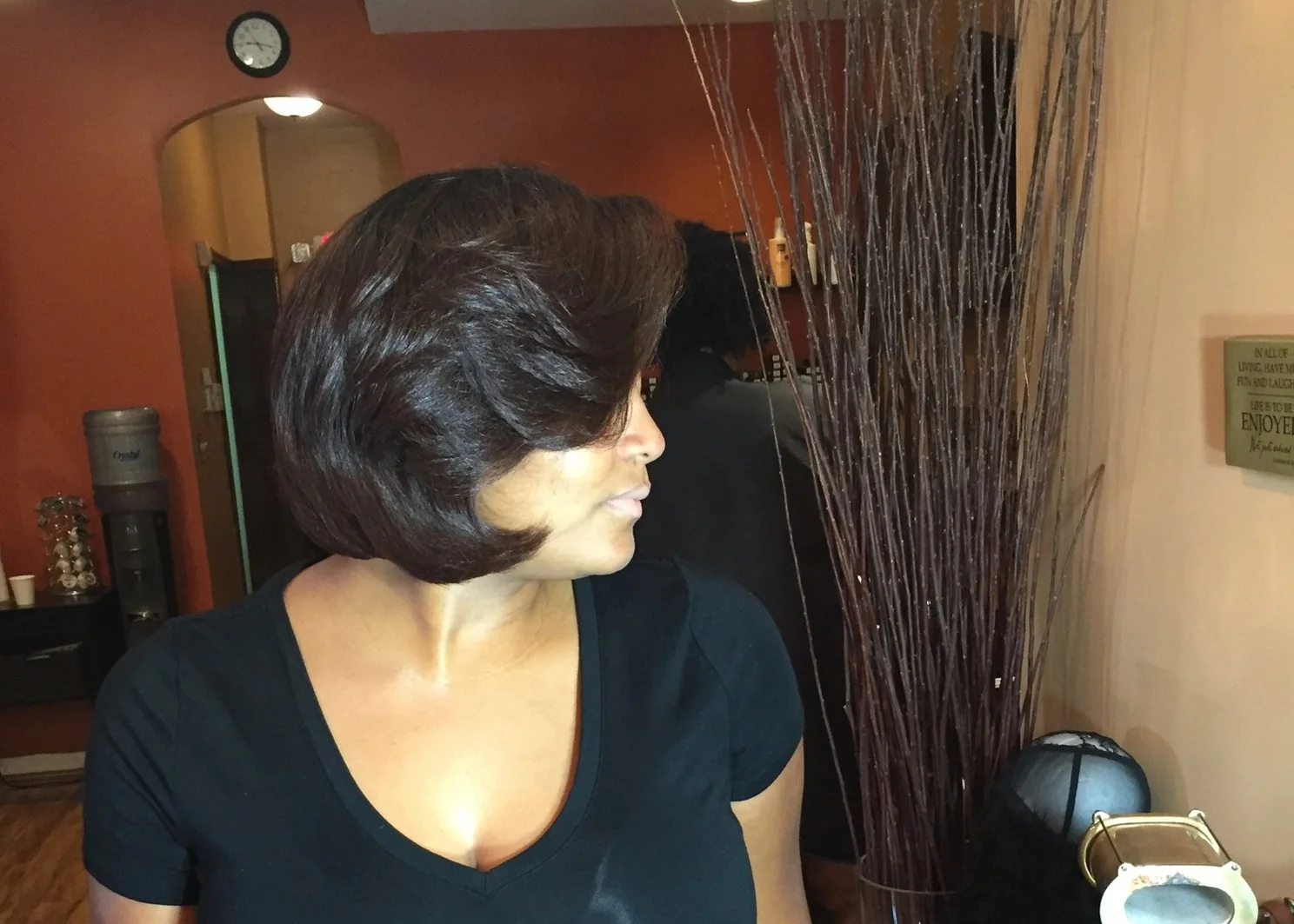 Precision Bob cut. Silk press. Titanium curled. Saran wrapped 
