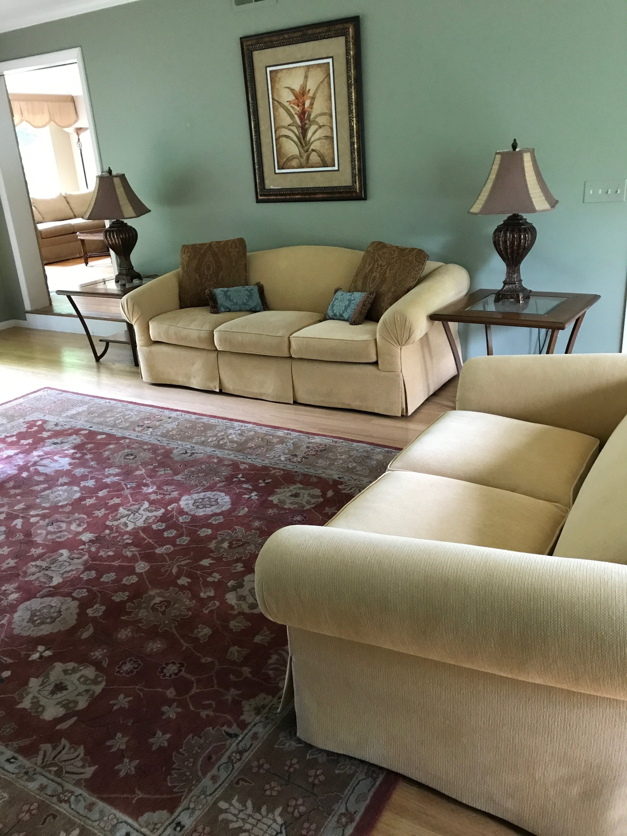 Matching buttercup yellow custom upholstered sofa & loveseat