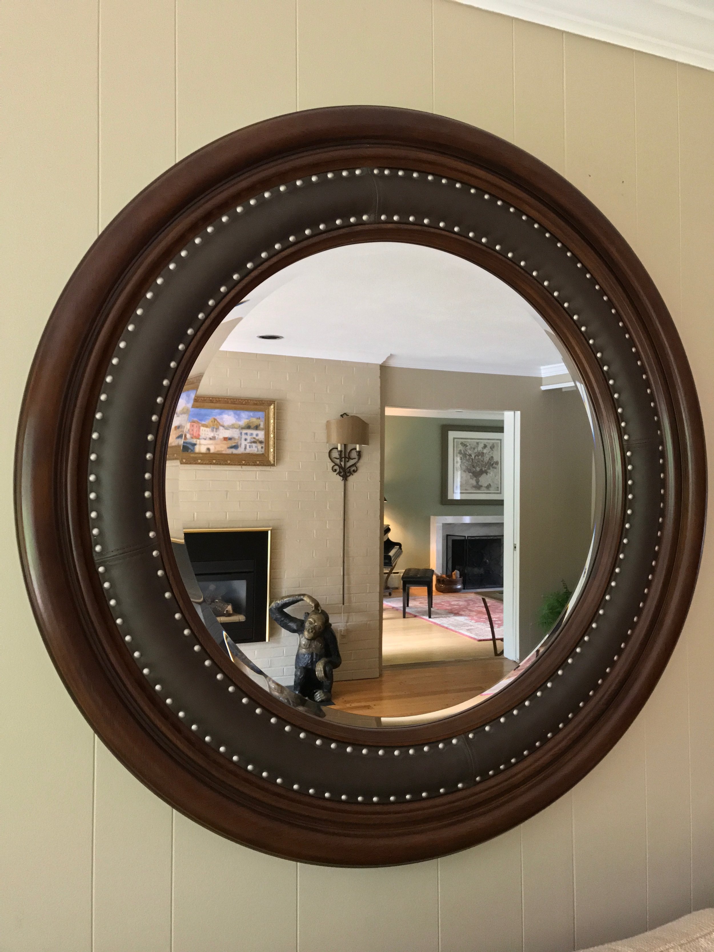 Large round wood and leather mirror