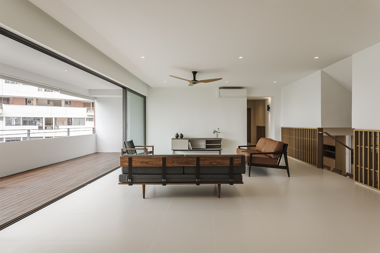 Living room continues to large balcony at Pandan Valley Condominium