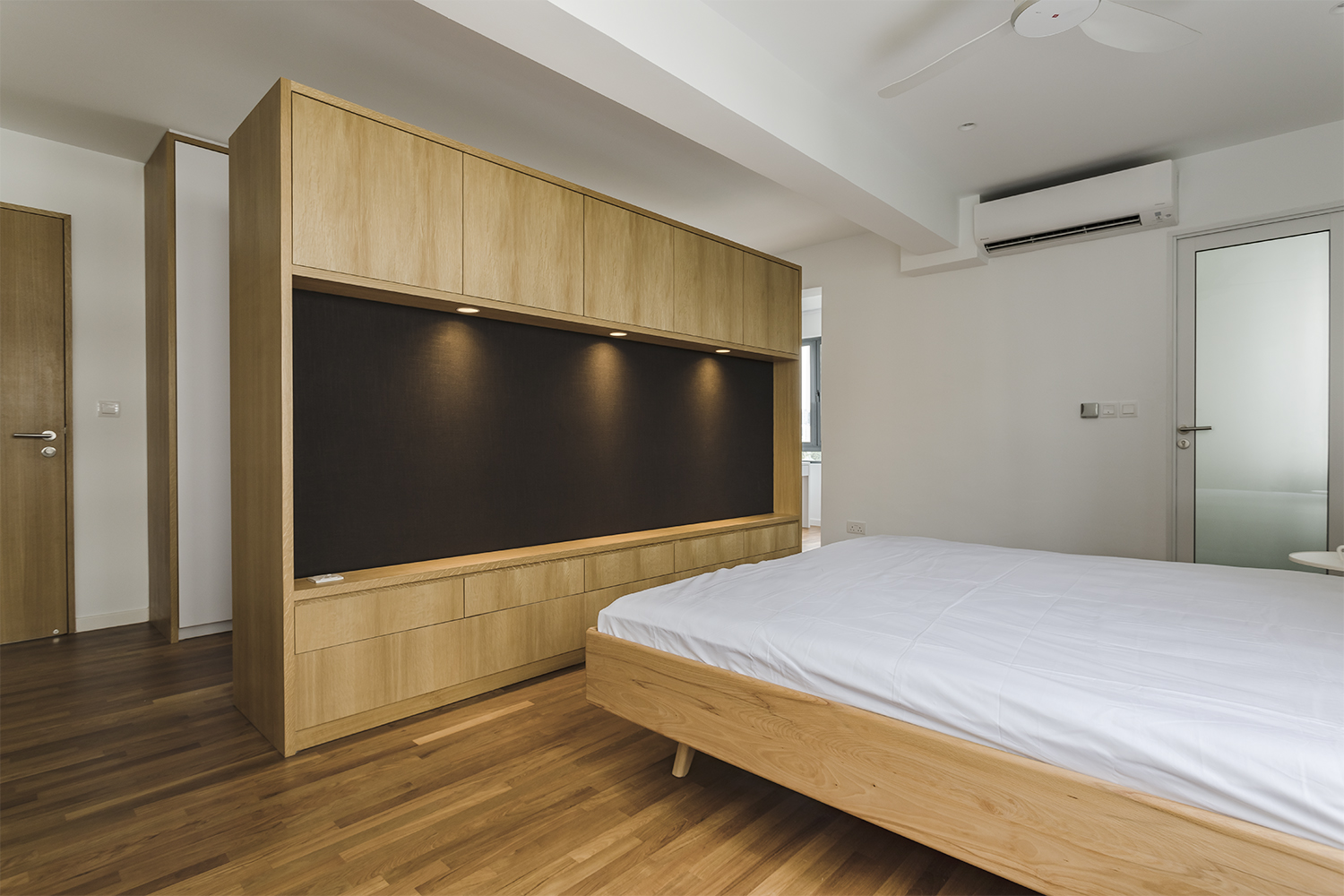 Free standing cabinet in master bedroom Kitchen counter provides visual continuity to dining room at Pandan Valley Condominium