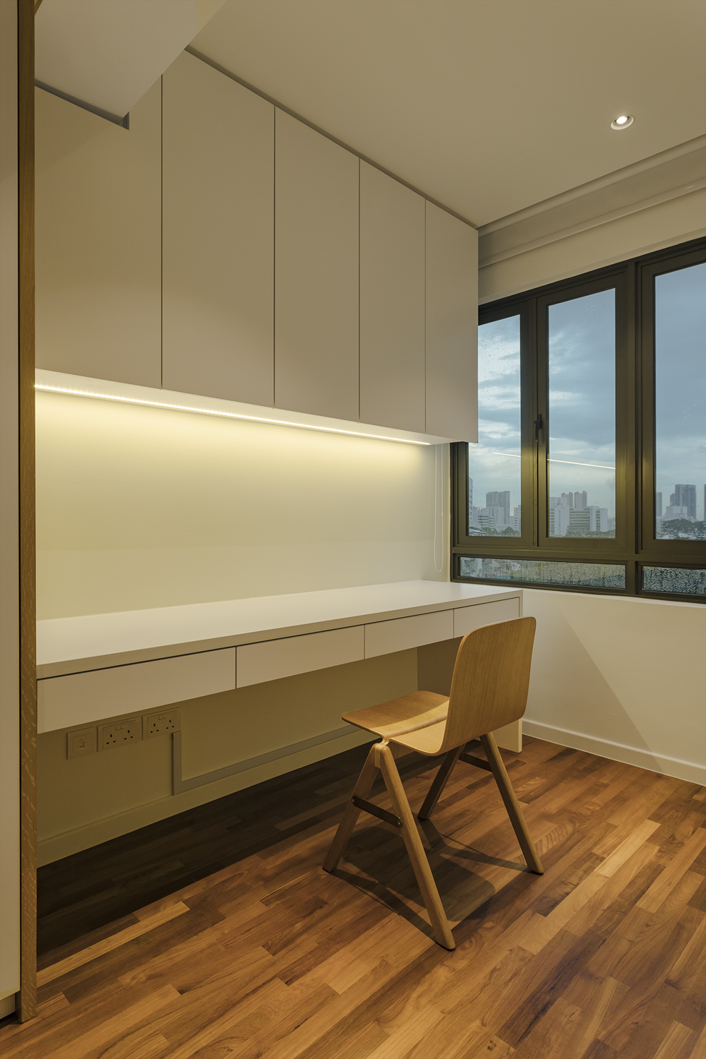 Study space in master bedroom Kitchen counter provides visual continuity to dining room at Pandan Valley Condominium