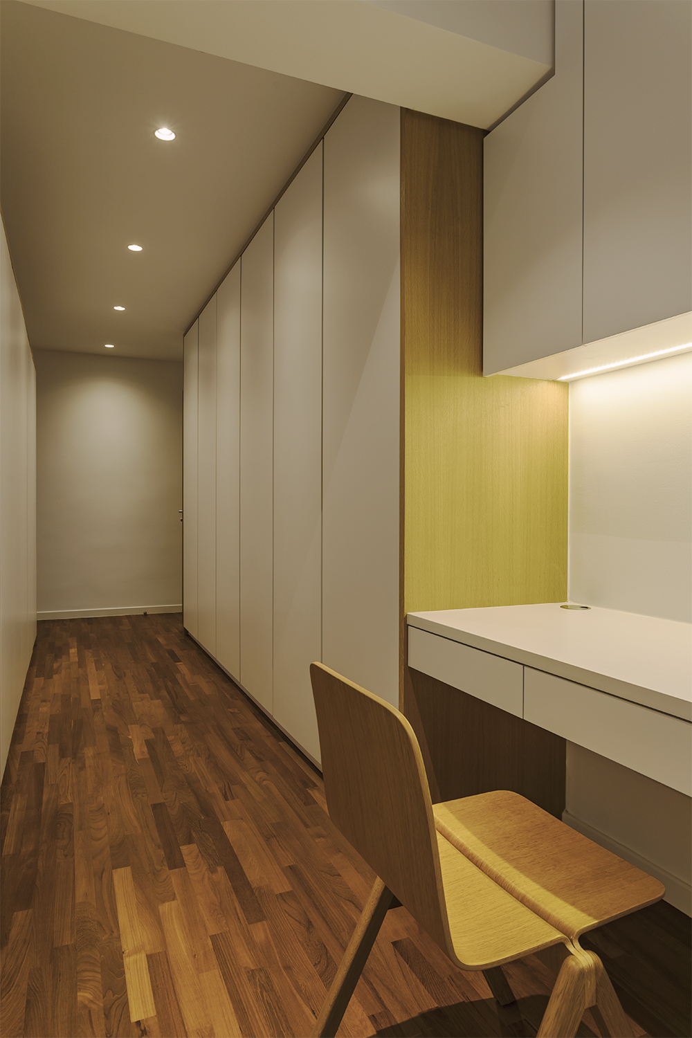 Master study space and walk in wardrobe Kitchen counter provides visual continuity to dining room at Pandan Valley Condominium