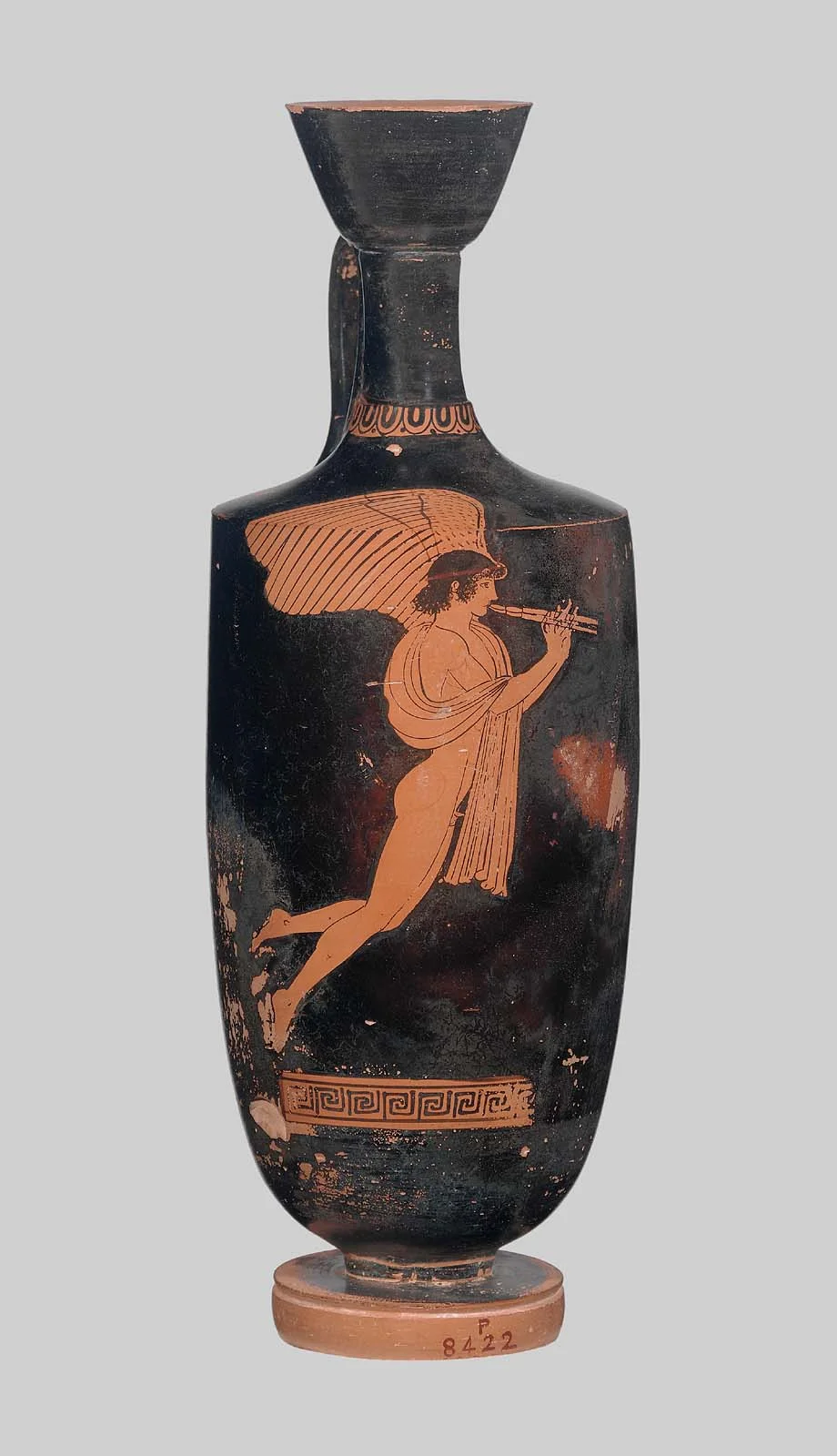 Oil Flask showing Eros as he plays the aulos