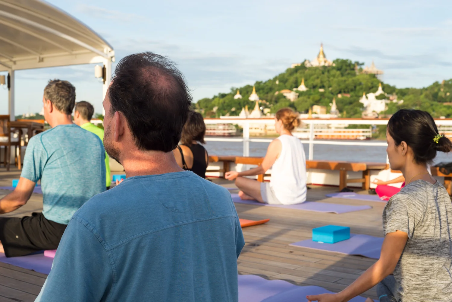 Yoga on the deck of the road to Mandalay