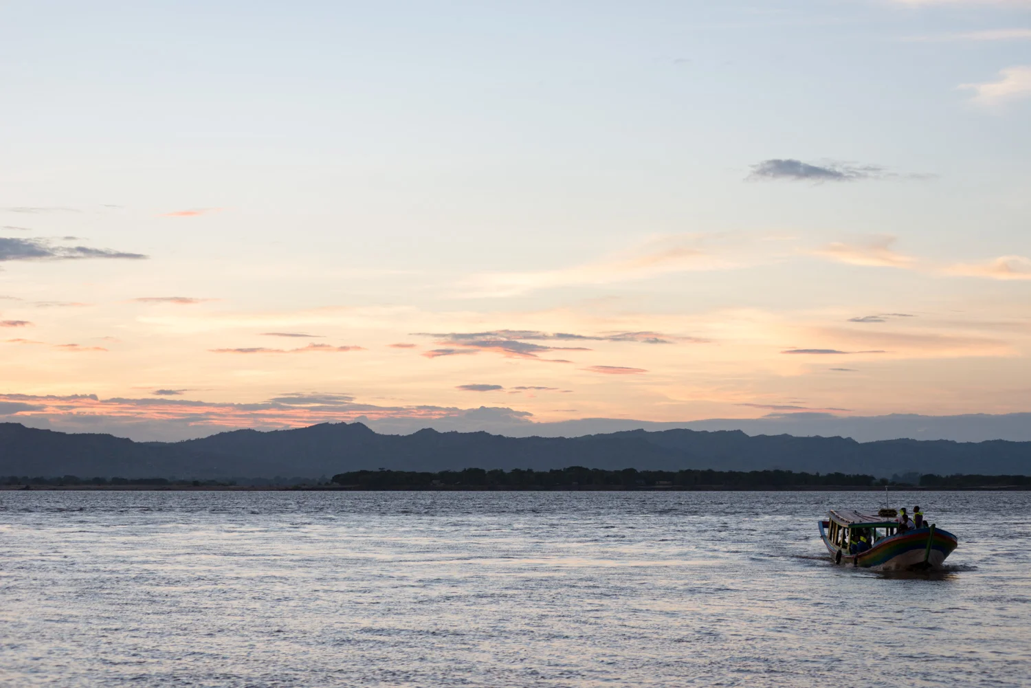 Sunset over a Road to Mandalay ferry