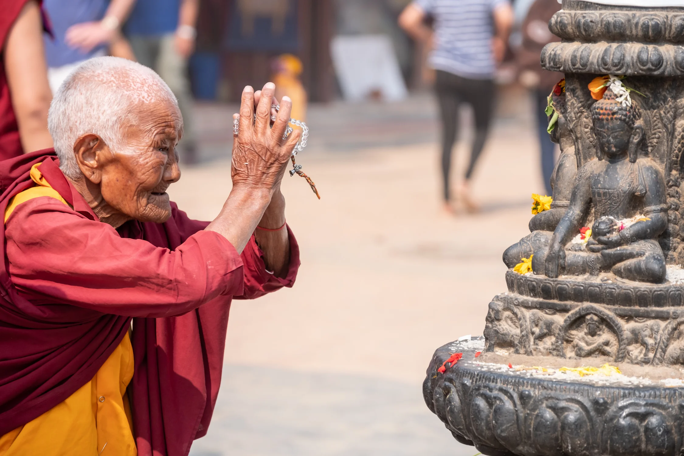 Nun at Boudhanath Stupa