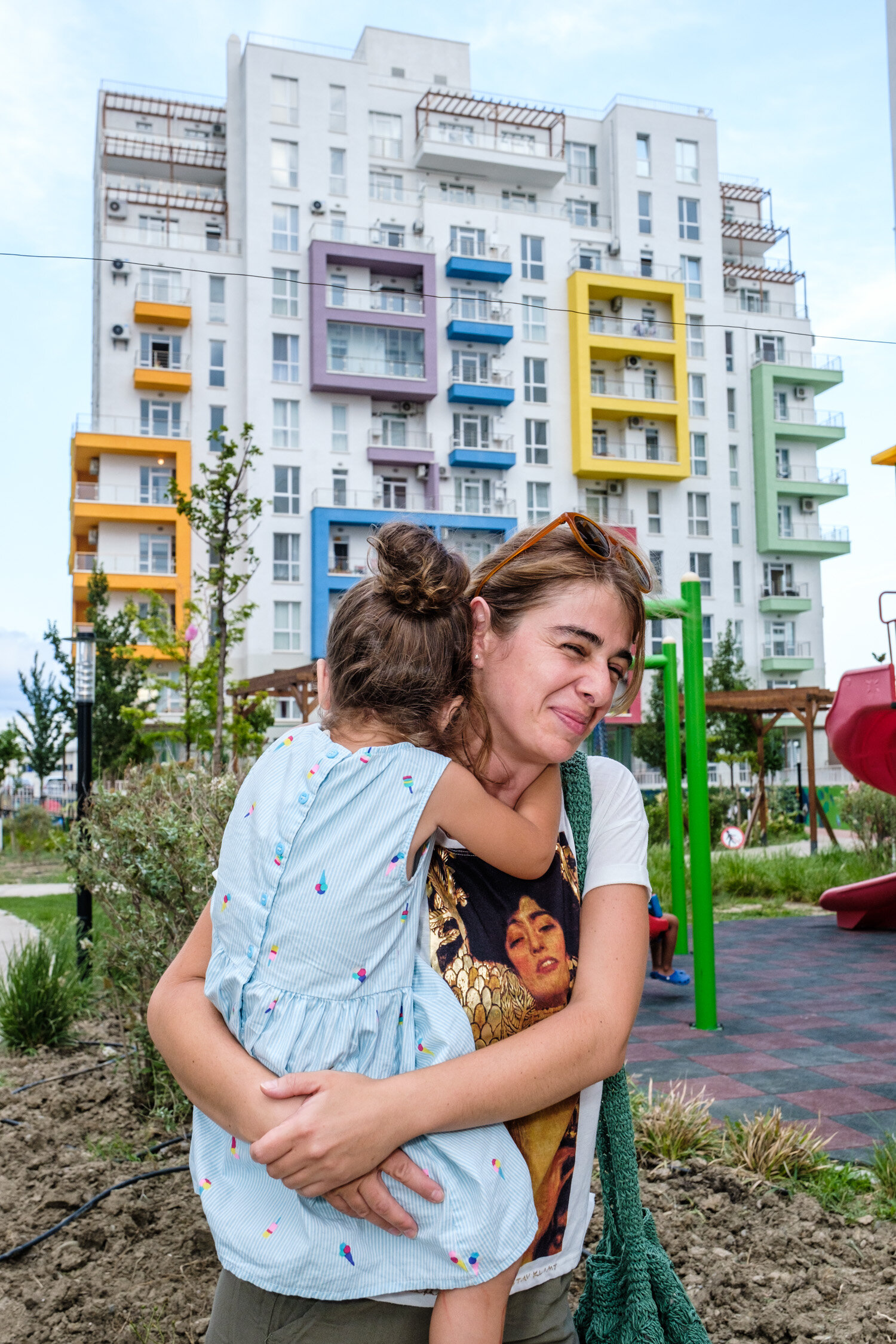 Activist Mariam Maghradze, 35, holds her daughter Marta, 3
