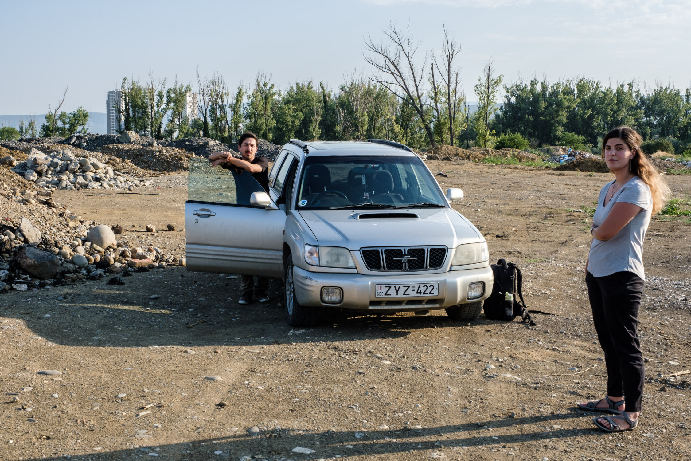 Ana and her husband Tony at the previous dump site. Topsoil hides several meters of dumped industrial debris