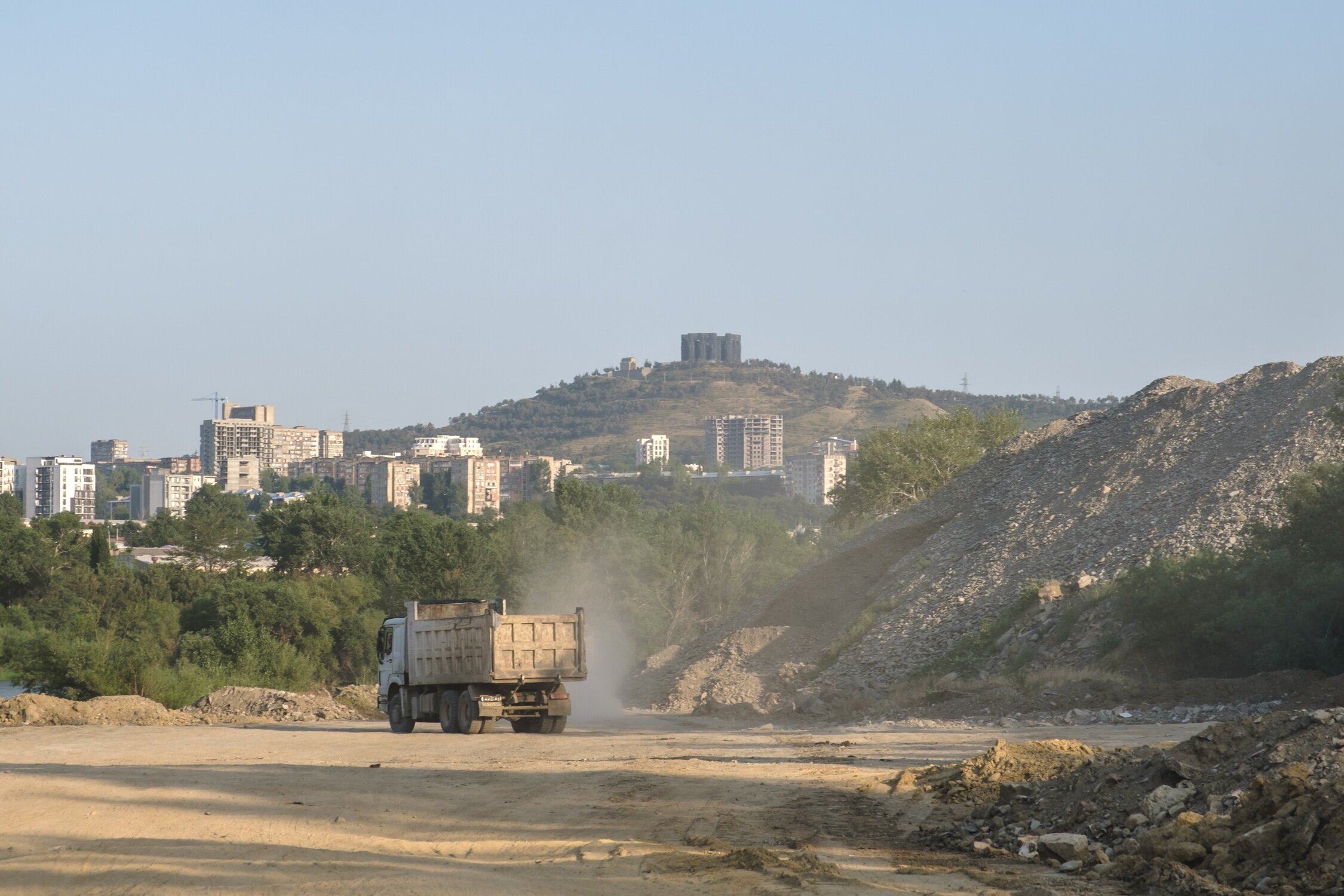 Trucks flee as the activists arrive