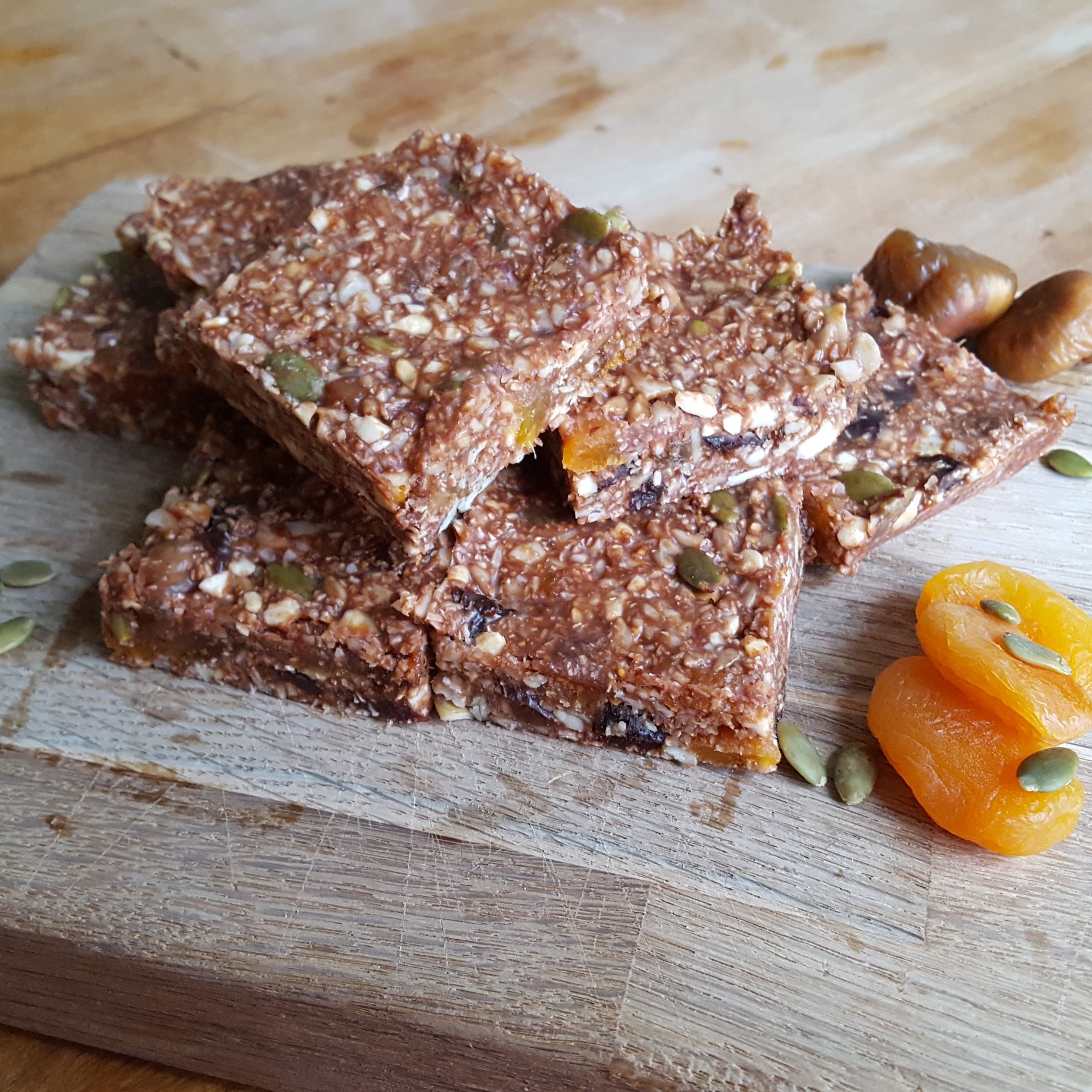 Sarah Styles-Power: Fruit, nut and seed bars. They are gluten and dairy free, and I make them vegan by using date syrup instead of honey. Take 50g almonds, 50g cashews, 30g sunflower seeds 40g pumpkin seeds, 120g dried apricots and figs, 30g desiccated coconut, and a pinch or two of salt, all roughly chopped. Mix with 4 tbsp melted coconut oil, 4 tbsp date syrup, 3 tbsp peanut (or other nut) butter, ½ tsp vanilla extract. Stir, press into baking tray, refrigerate, slice, eat!