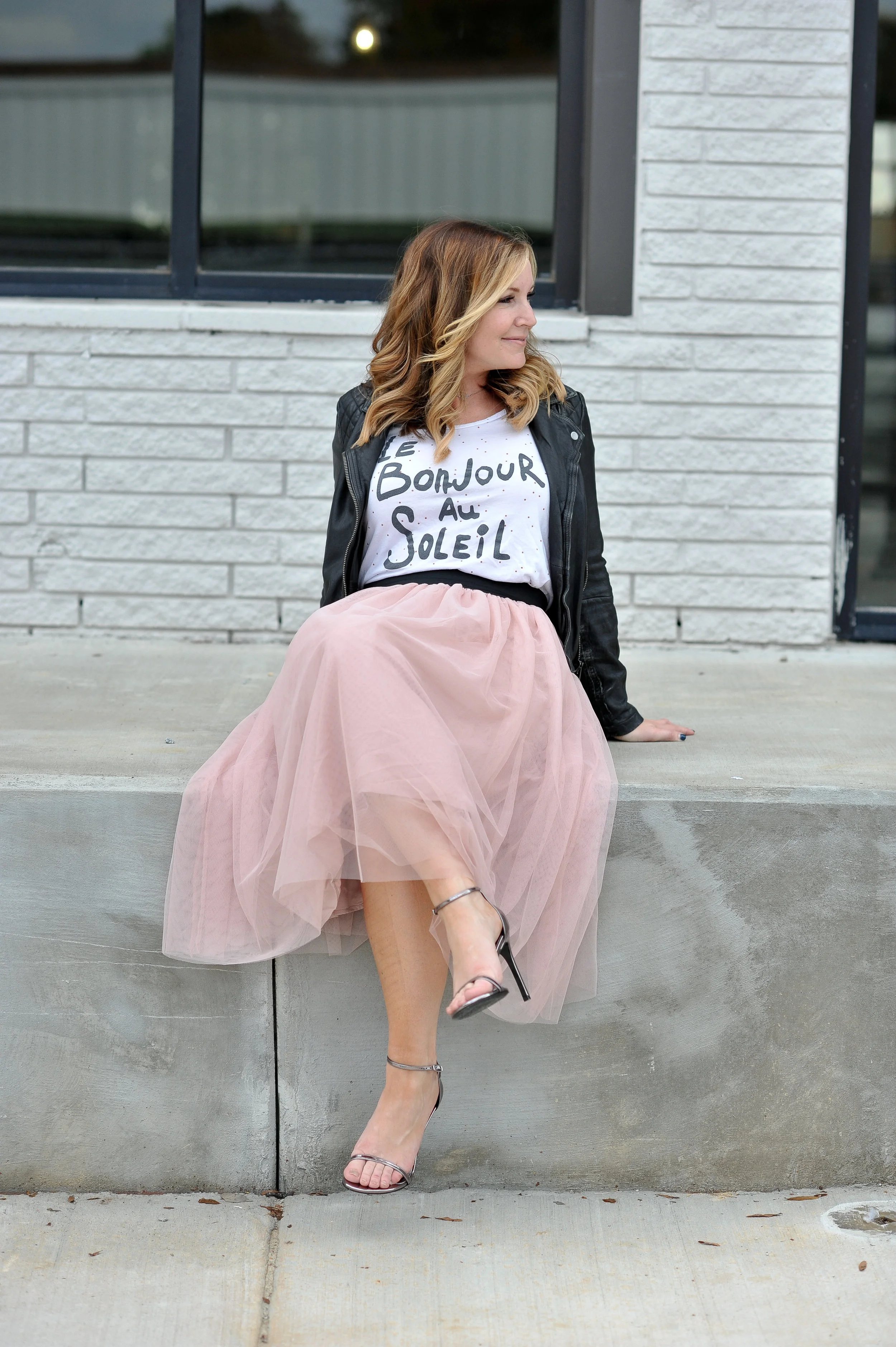 This entire outfit is from Nordstrom, because we are MARRIED. Most of it is from last year though, so I've found similar options for y'all. jacket ( similar ) | tulle skirt ( similar ) | graphic tee (mine is old, but this one's LEGIT ) | heels | photo by jnelly photography