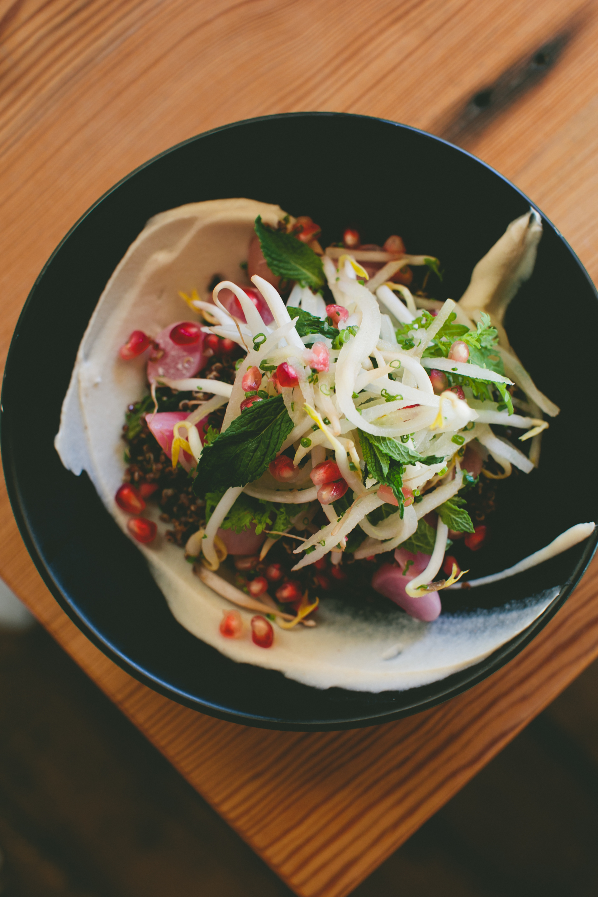 Quinoa, coconut, radish, pomegranate, and kimchi at West Bridge|| via A Thought For Food