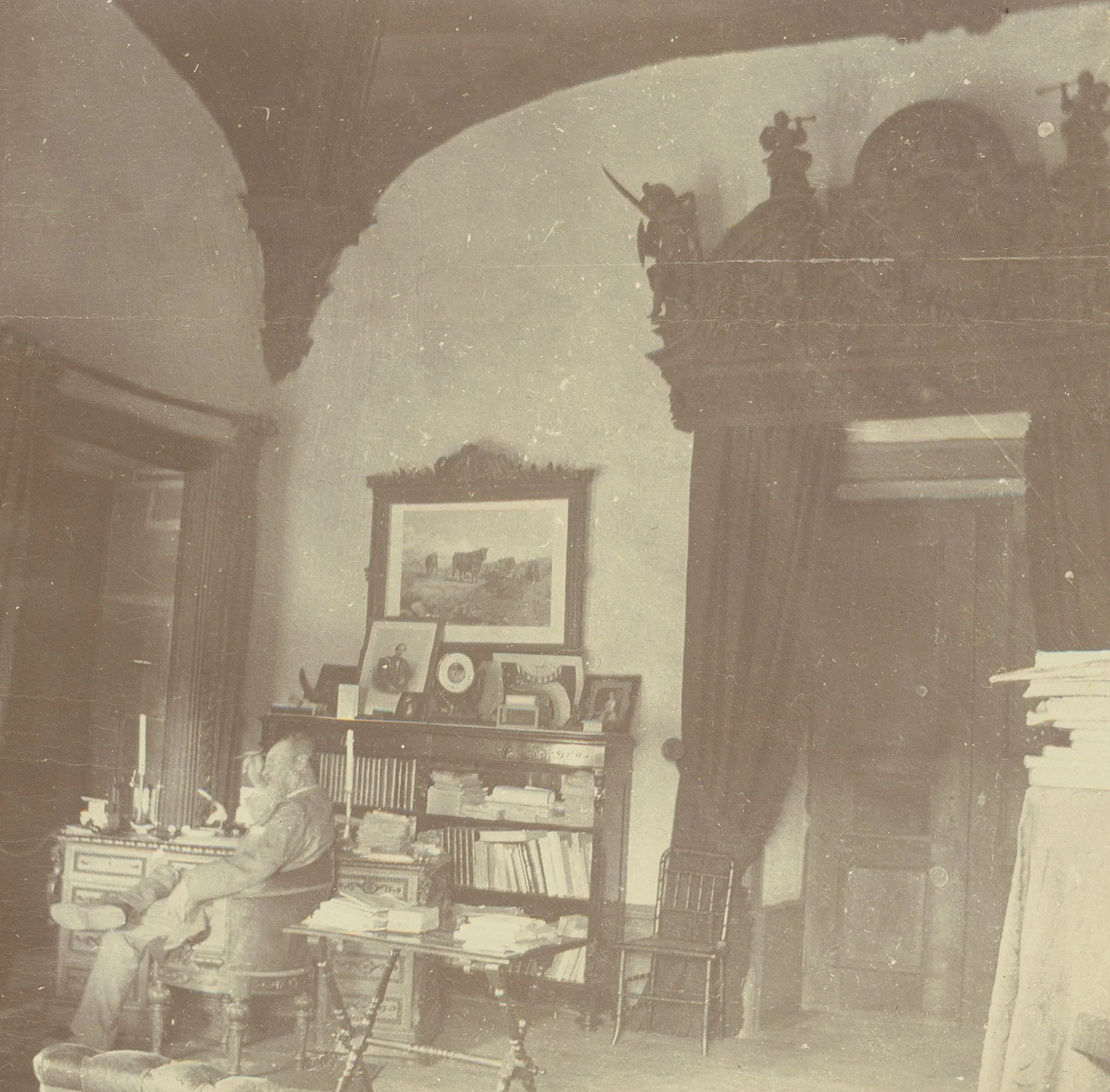 A son holds the portrait of his father on his desk 