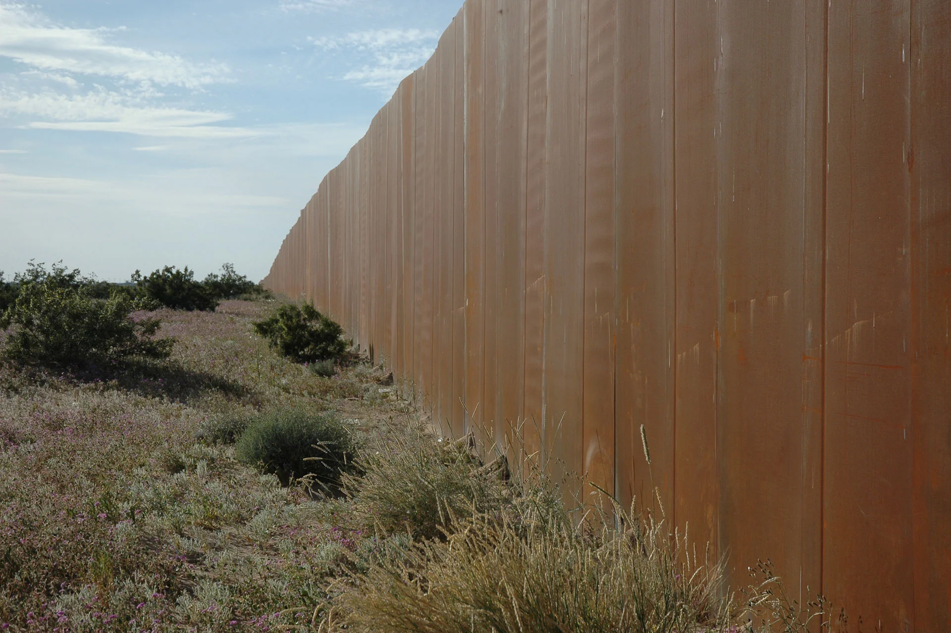 The Wall, US border, separating Mexico from the US, along Highway 2, Sonora Desert, Mexican side
