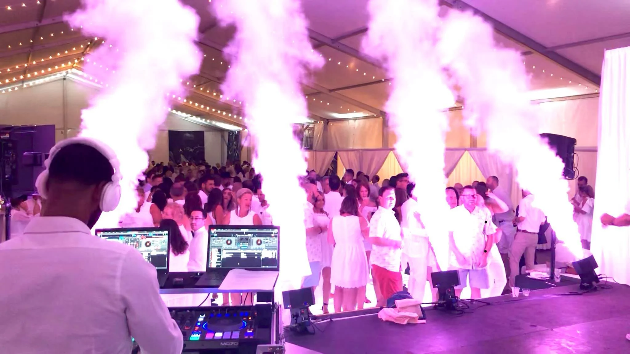 CO2 cannon special effects blast on a crowded dance floor during a high-energy event in Rochester, NY.