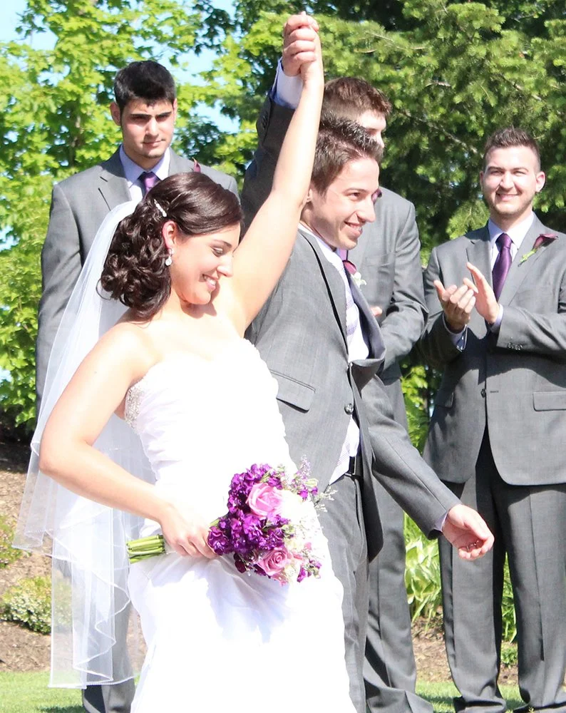 A bride and groom make their grand entrance to a cheering crowd. Sound Express Entertainment ensures your introductions are high energy and perfectly timed to set the tone for the rest of the night.