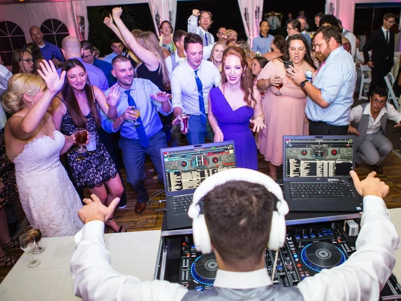 DJ view of a packed, high-energy wedding dance floor managed by Sound Express Entertainment in Rochester, NY.