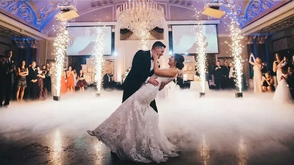 Bride and groom sharing their first dance surrounded by a stunning cold sparkler fountain display by Sound Express Entertainment in Rochester, NY.