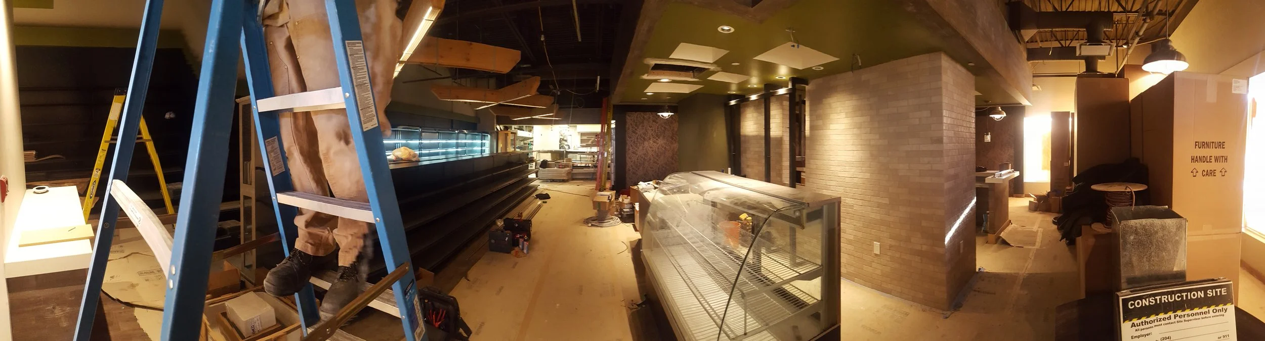 Panoramic view of Agora Fine Foods and Bistro & Wine Bar nearing completion.