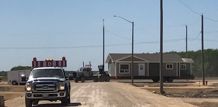 The first of 190 homes arriving at Lake St. Martin, Manitoba