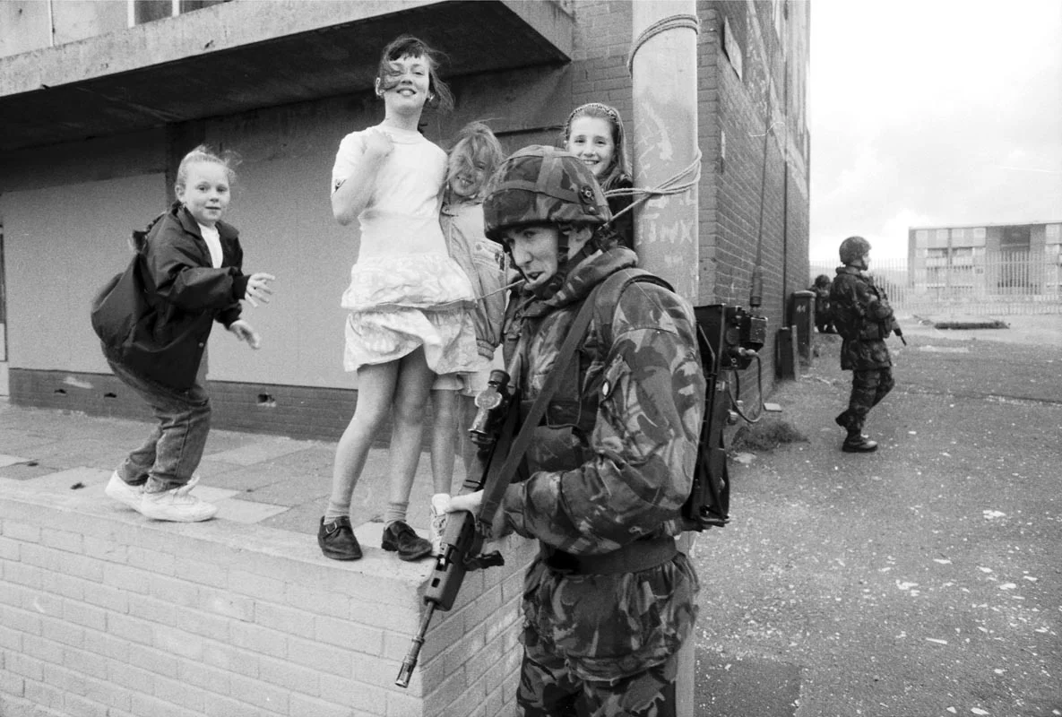 Soldier with Girls at New Lodge.jpg