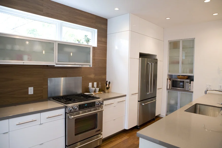  Kitchen with customize Ikea cabinets and walnut wall.  with Hive Modular 