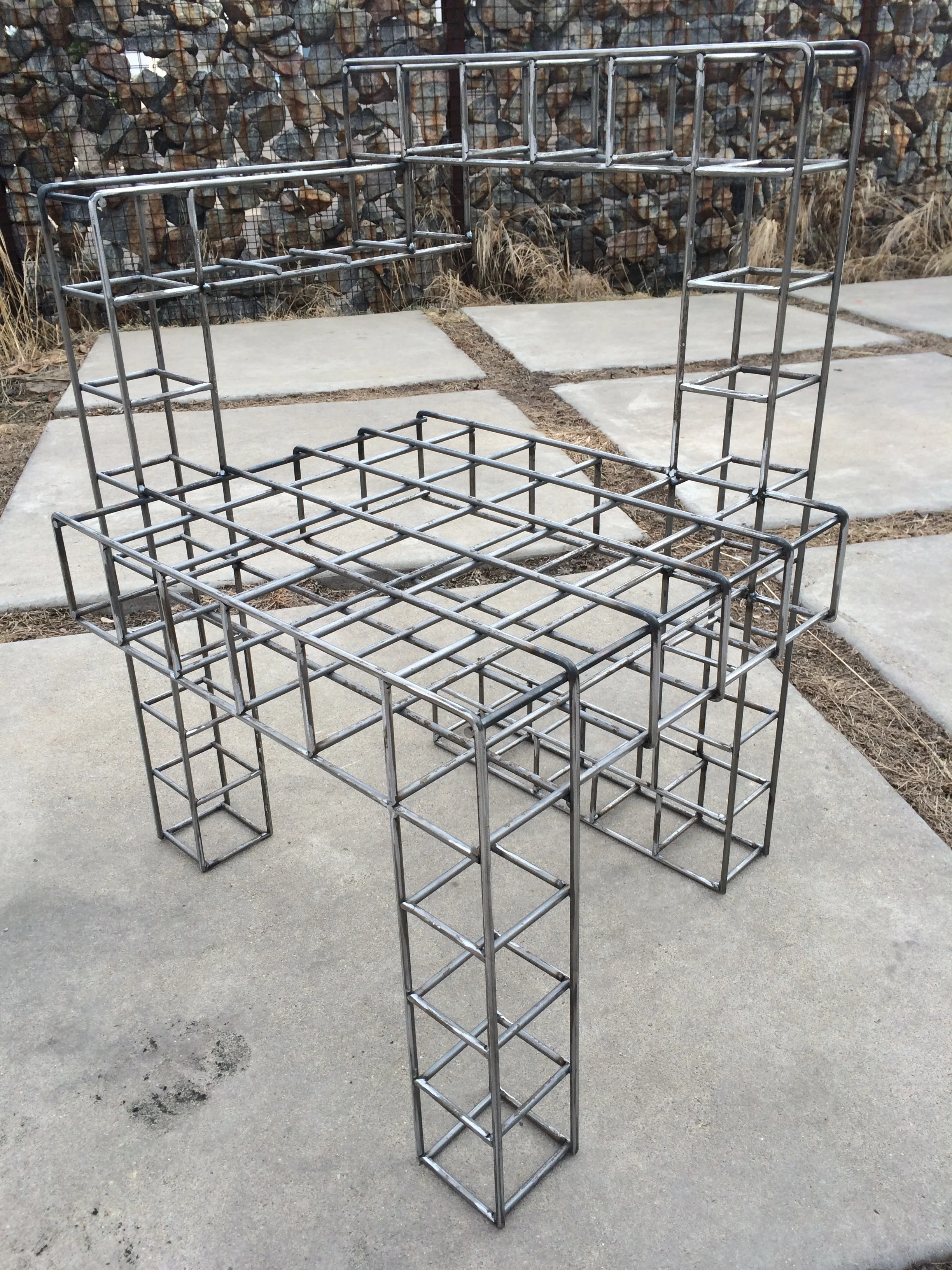  Collaborative work with  rolu . &nbsp;This is a take on a Garrit Rietveld chair made up of 3"x3" steel grid. &nbsp;This was taken prior to finish. 