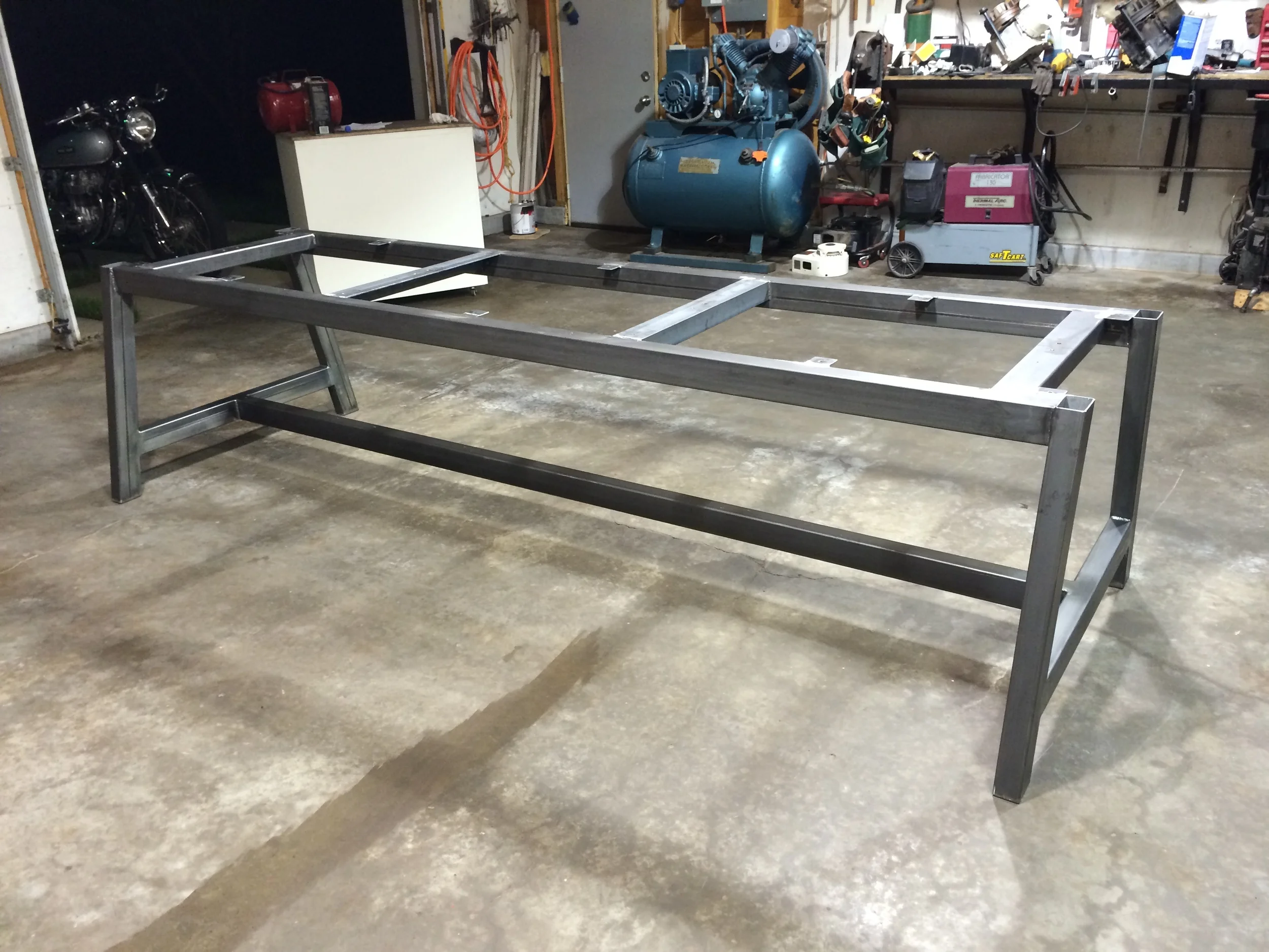  Conference table base #2 for  Epicurean Cutting Surfaces . &nbsp;Gun blued tube steel with a clear finish. &nbsp;The top will be a single 5'x12' piece of 1" thick Richlite. 