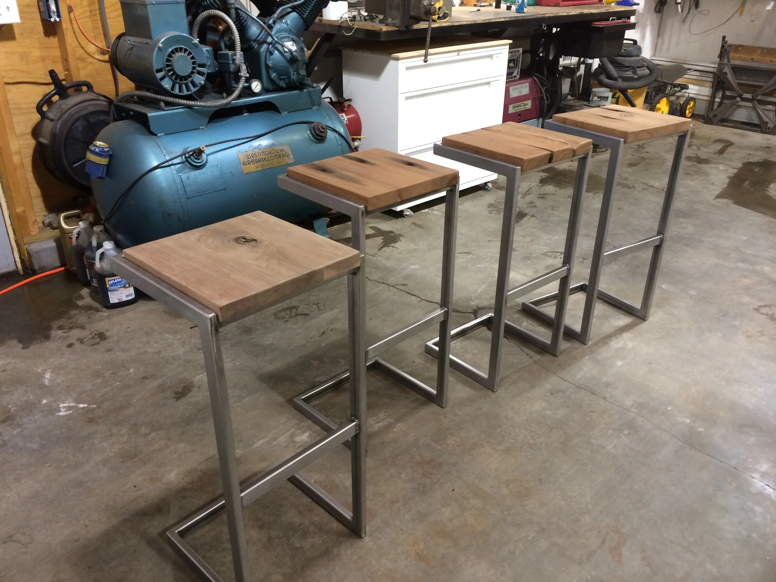  Four stools pre-finish application. 